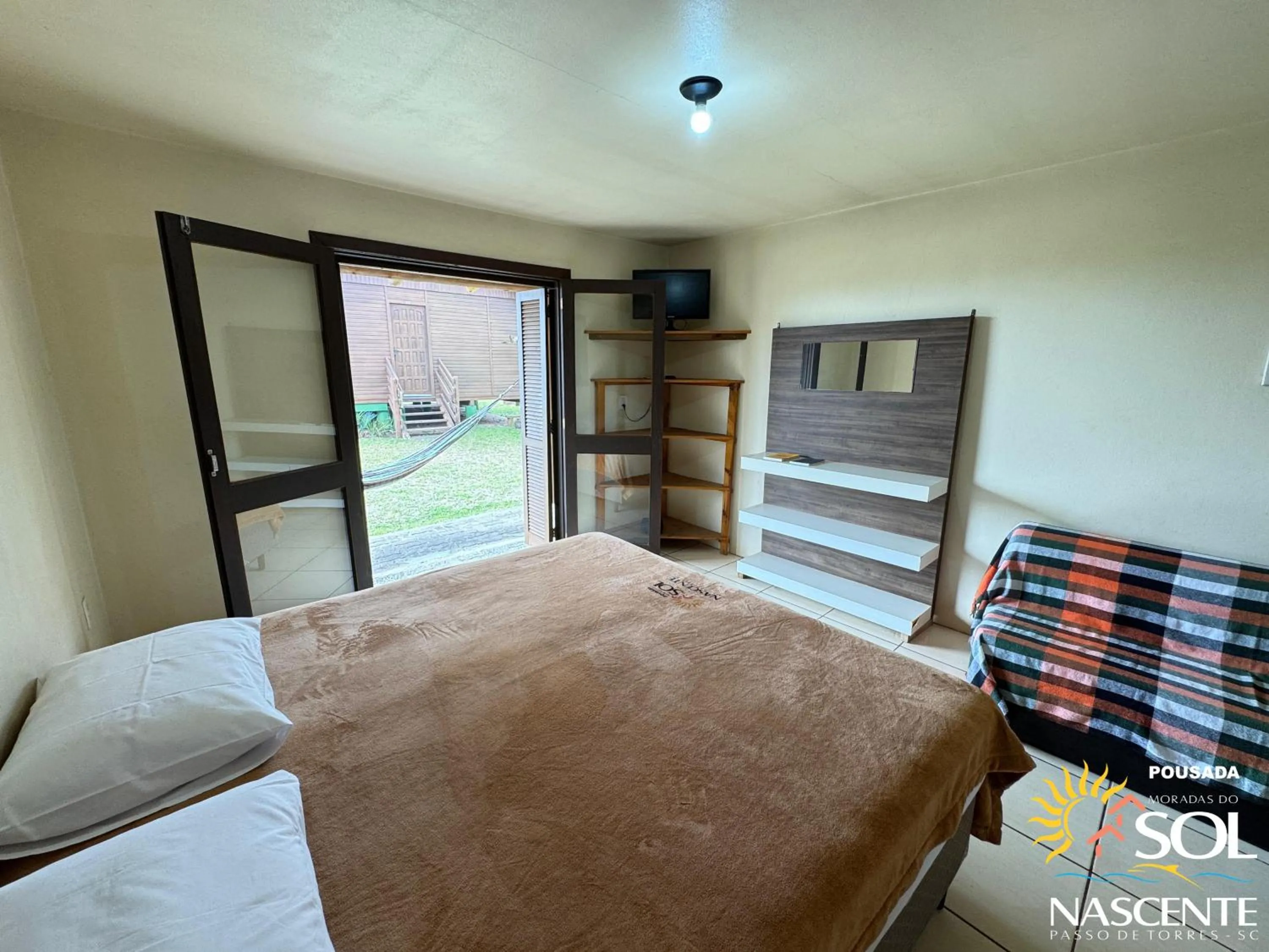 Photo of the whole room, Bed in Pousada Moradas do Sol Nascente