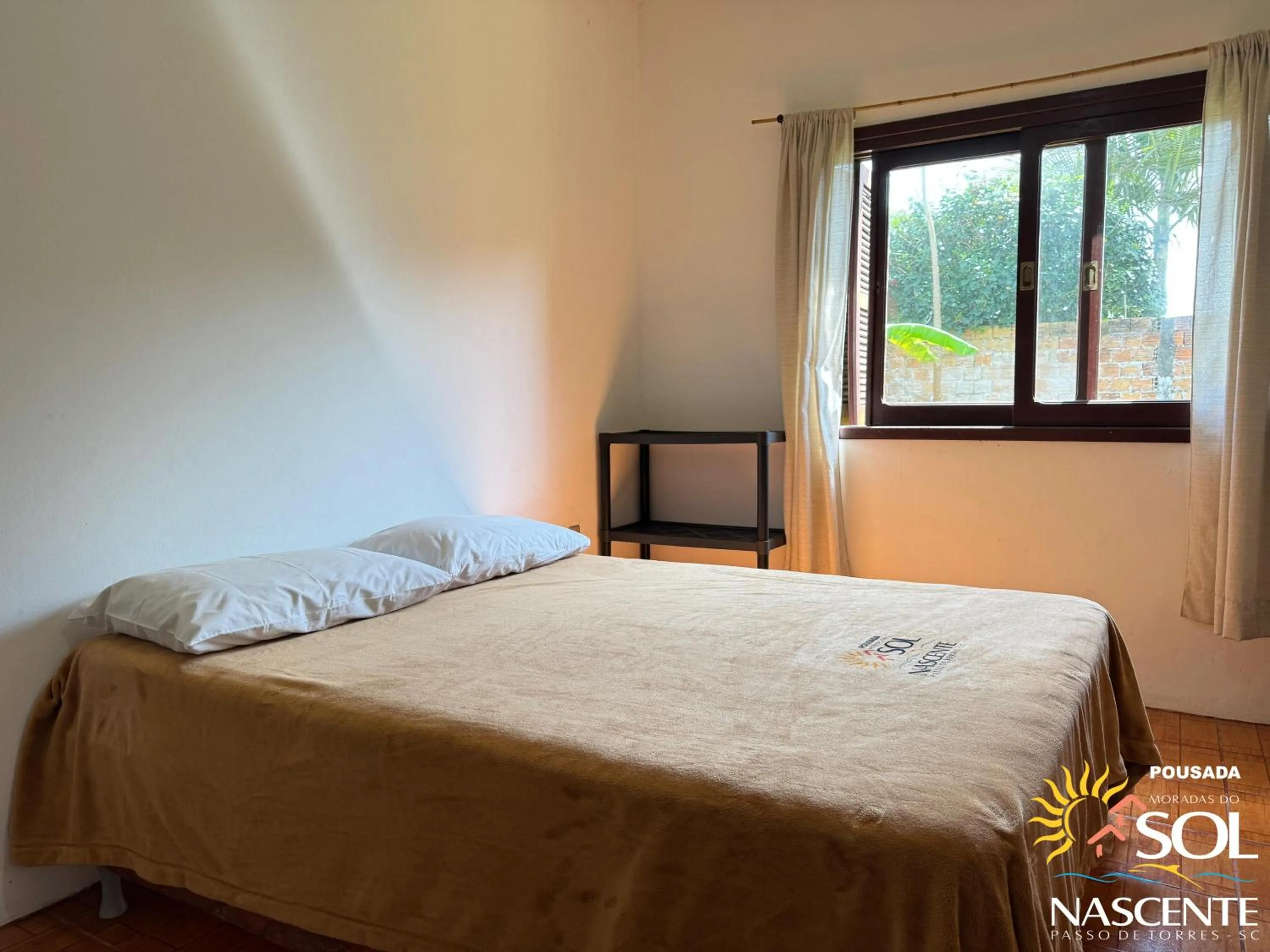 Photo of the whole room, Bed in Pousada Moradas do Sol Nascente