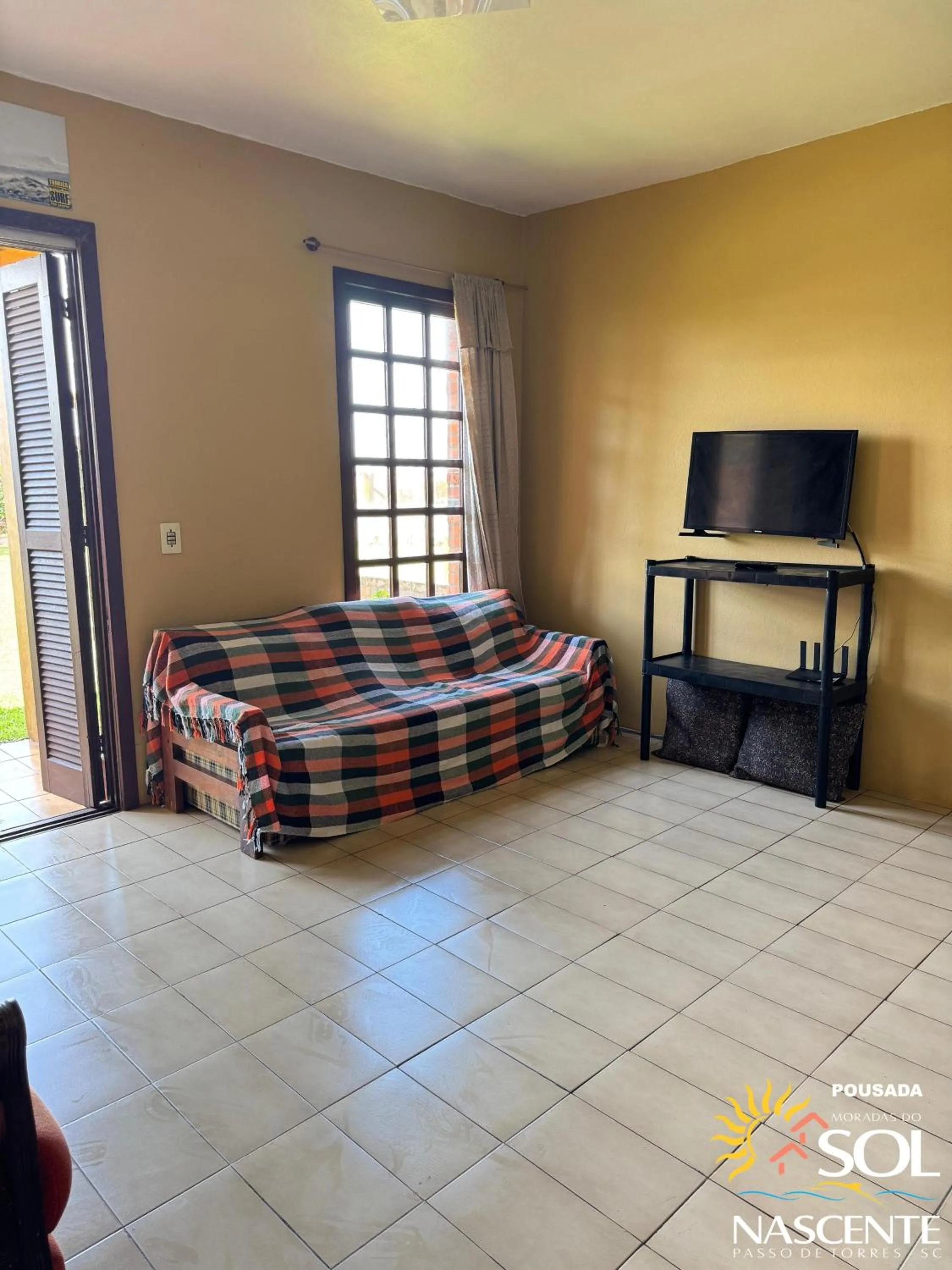 Living room, Bed in Pousada Moradas do Sol Nascente