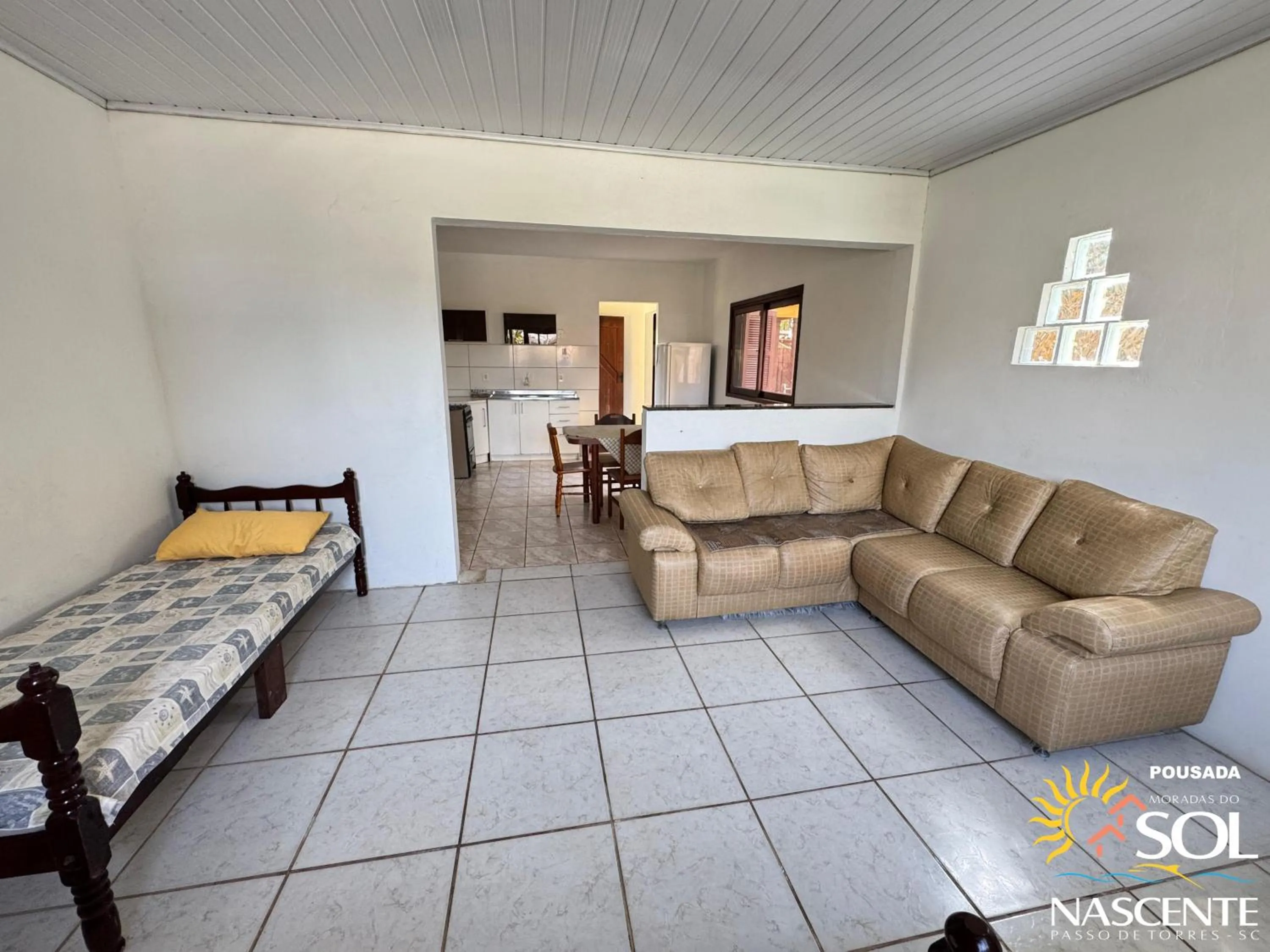 Living room, Bed in Pousada Moradas do Sol Nascente