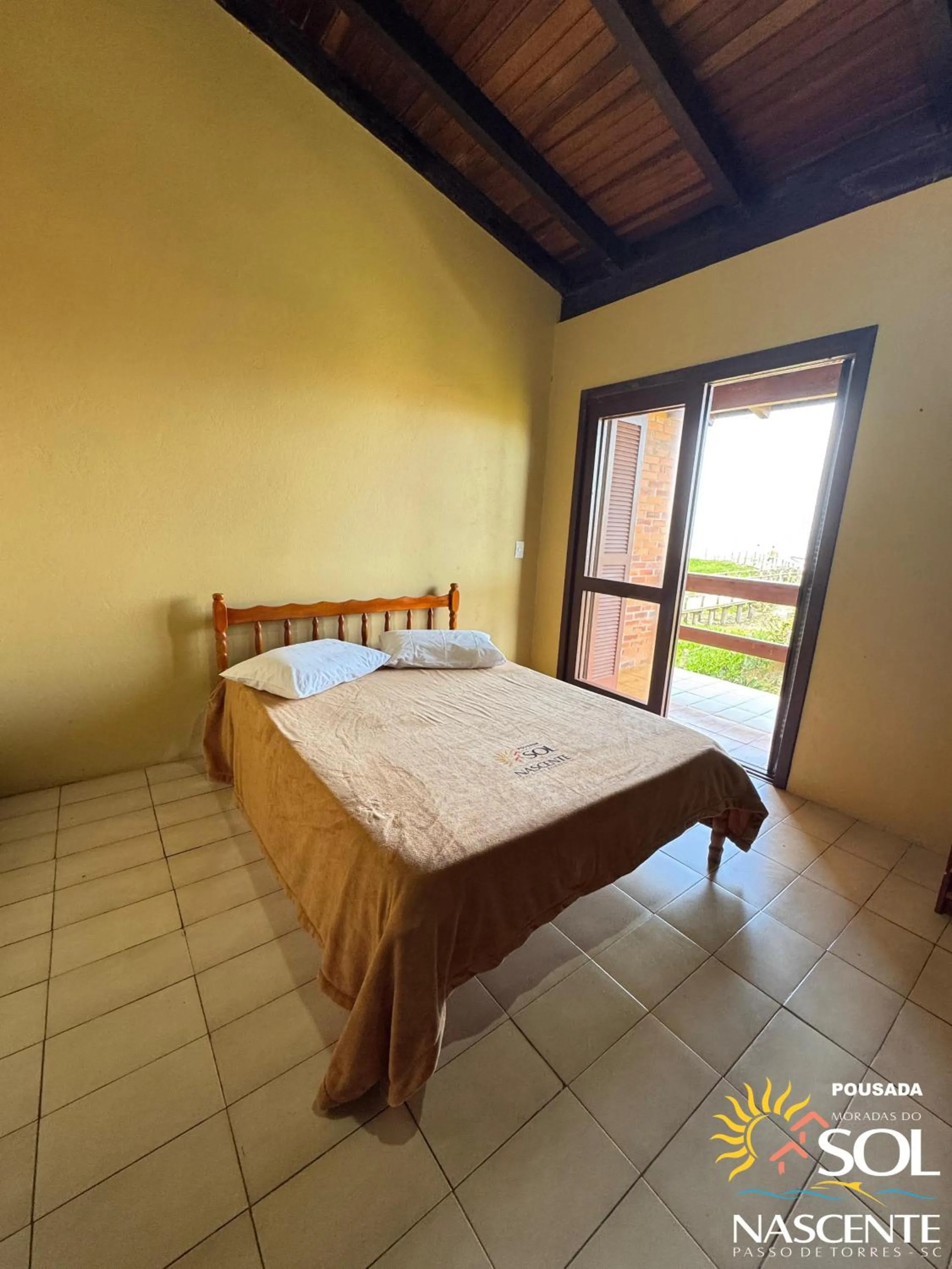 Photo of the whole room, Bed in Pousada Moradas do Sol Nascente