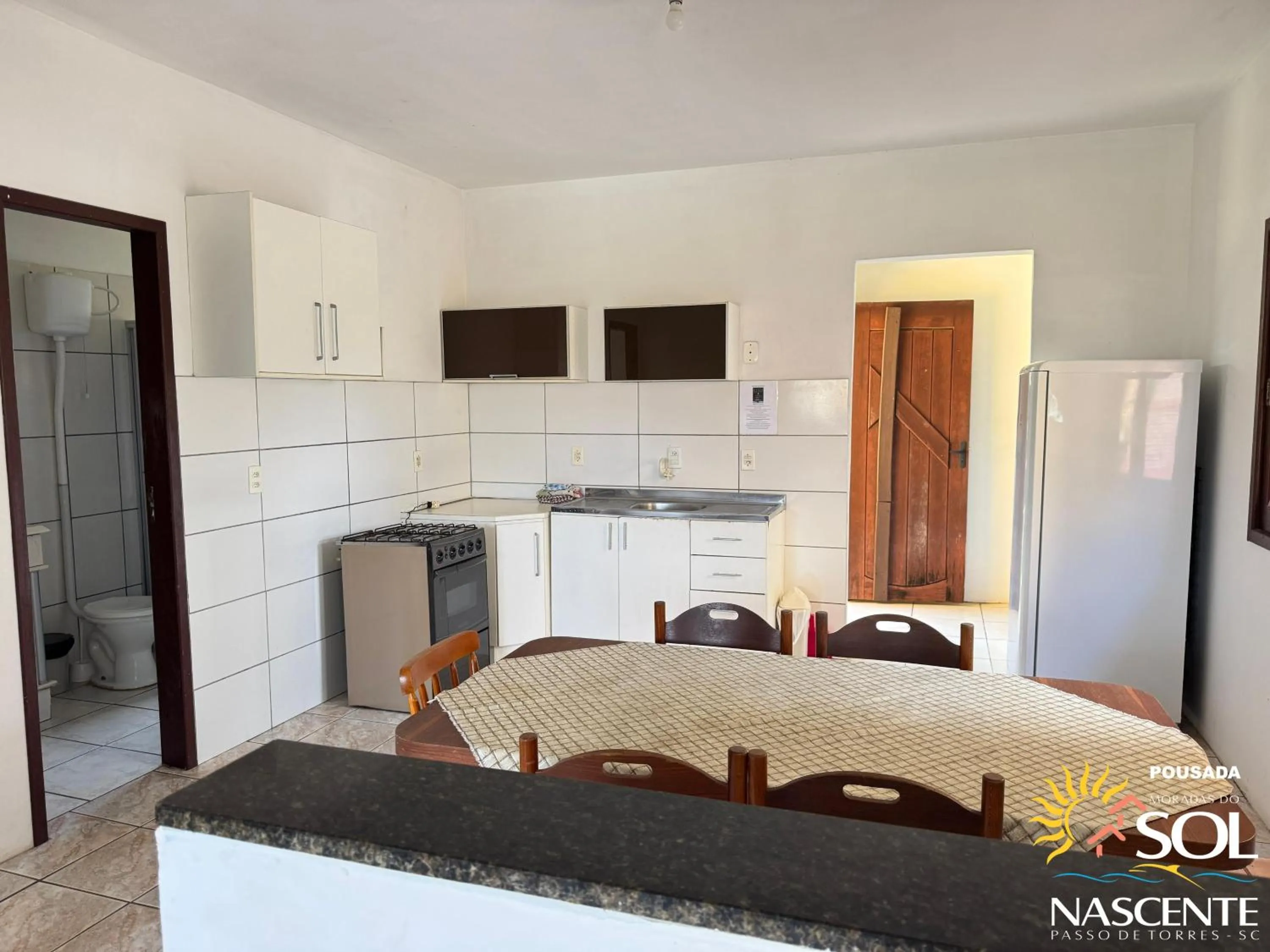 Kitchen or kitchenette in Pousada Moradas do Sol Nascente