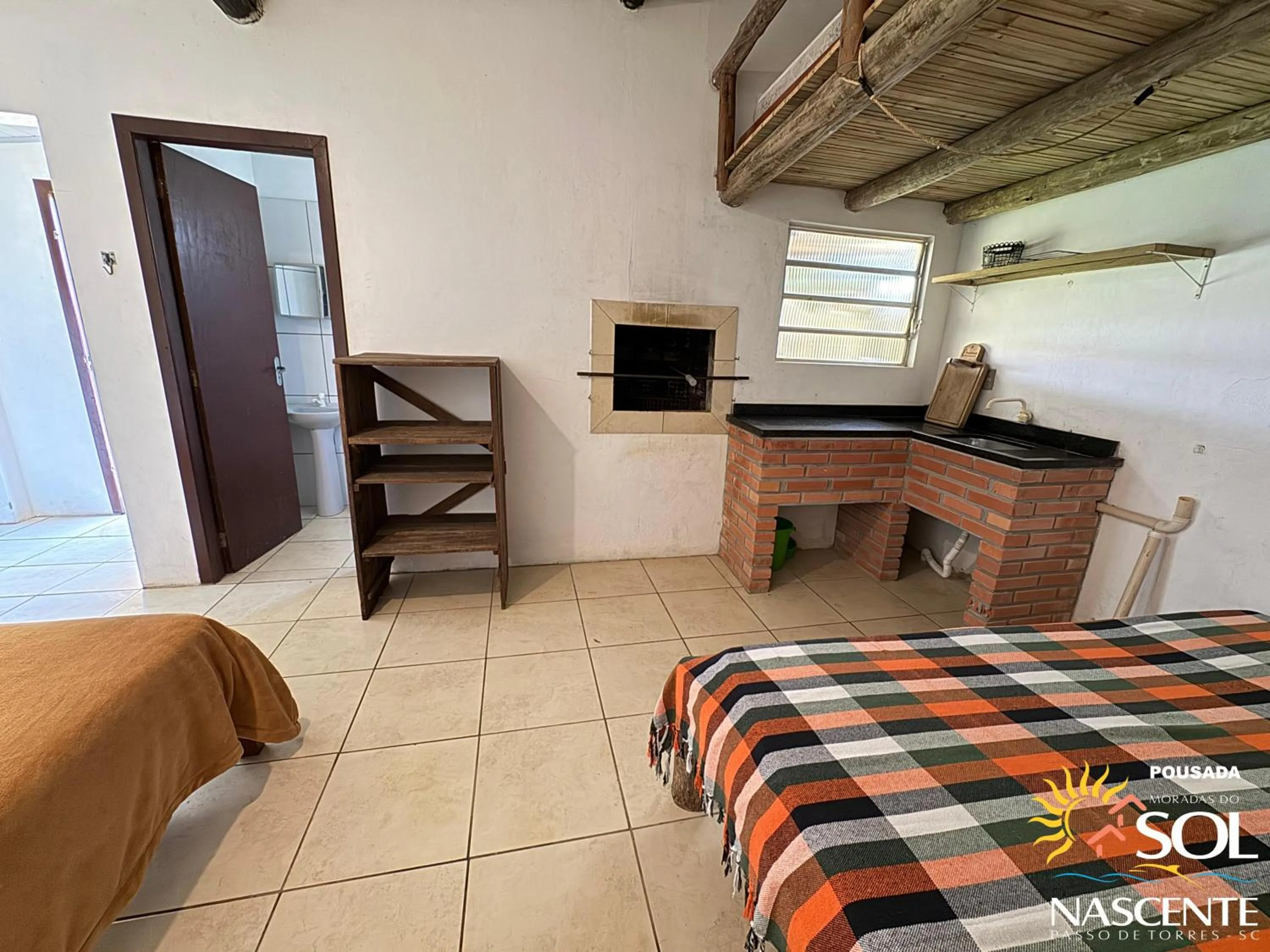 Photo of the whole room, Bed in Pousada Moradas do Sol Nascente