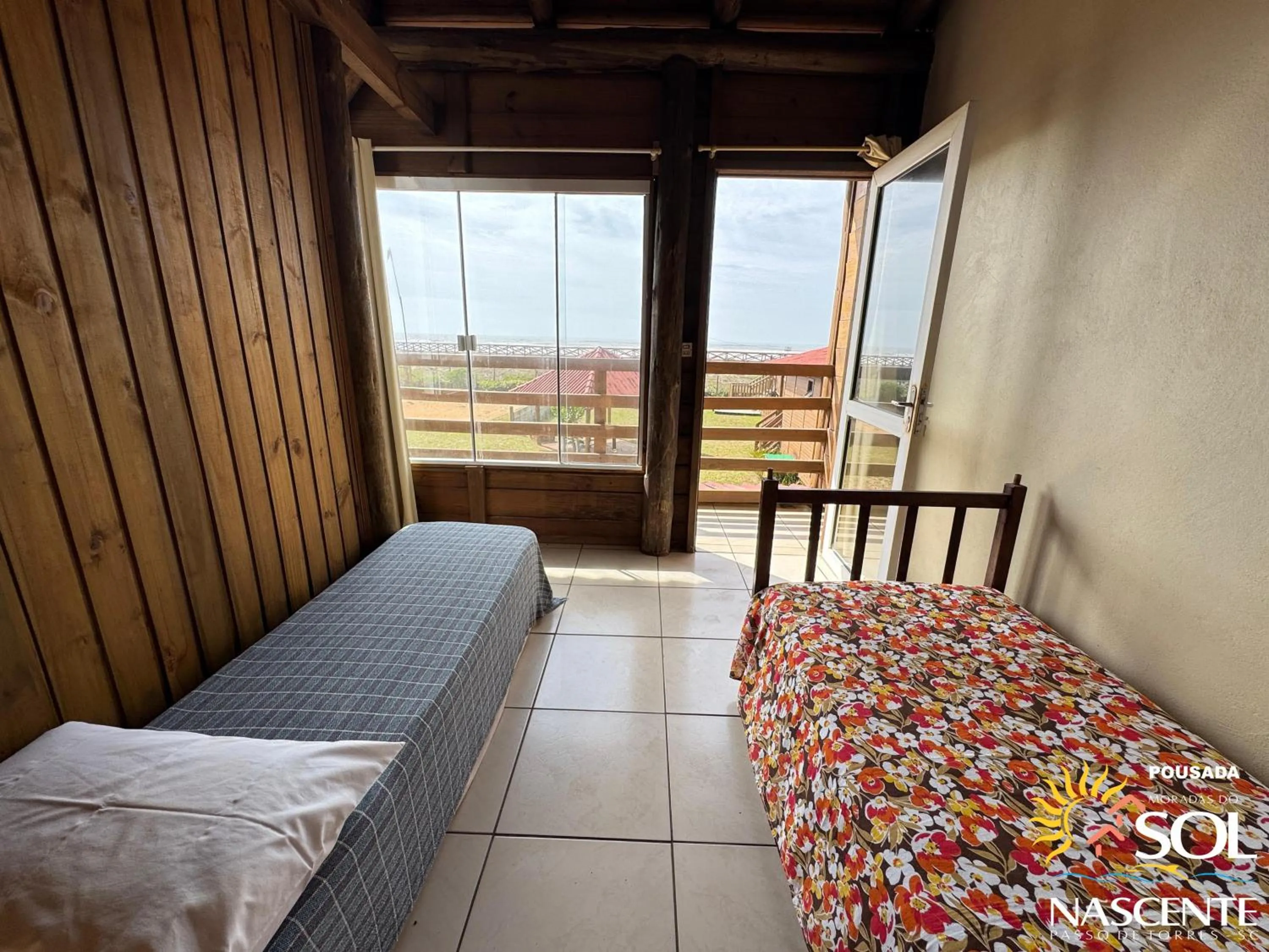 Photo of the whole room, Bed in Pousada Moradas do Sol Nascente