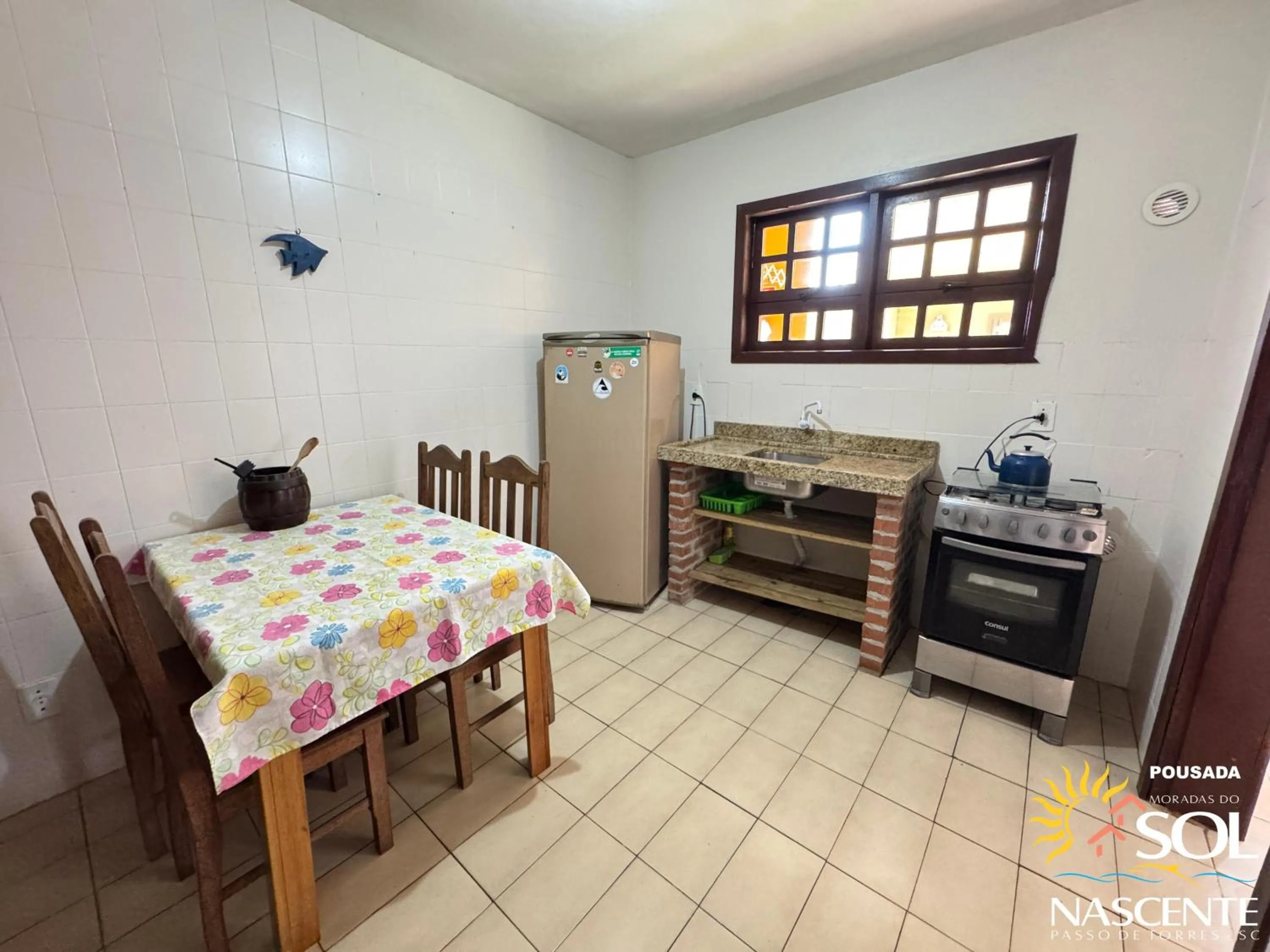 Kitchen or kitchenette in Pousada Moradas do Sol Nascente