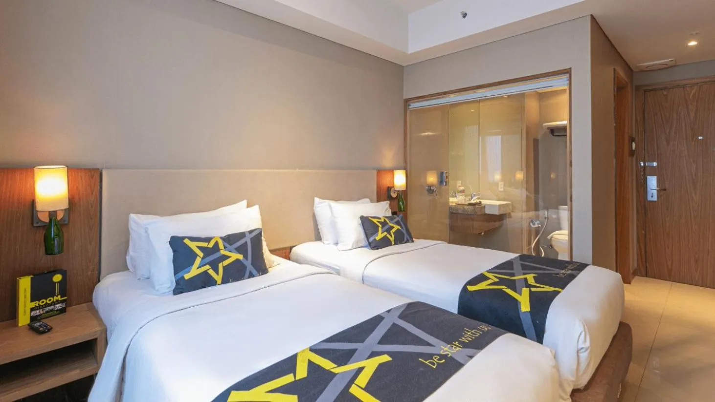 Bed in Yellow Star Ambarukmo Hotel