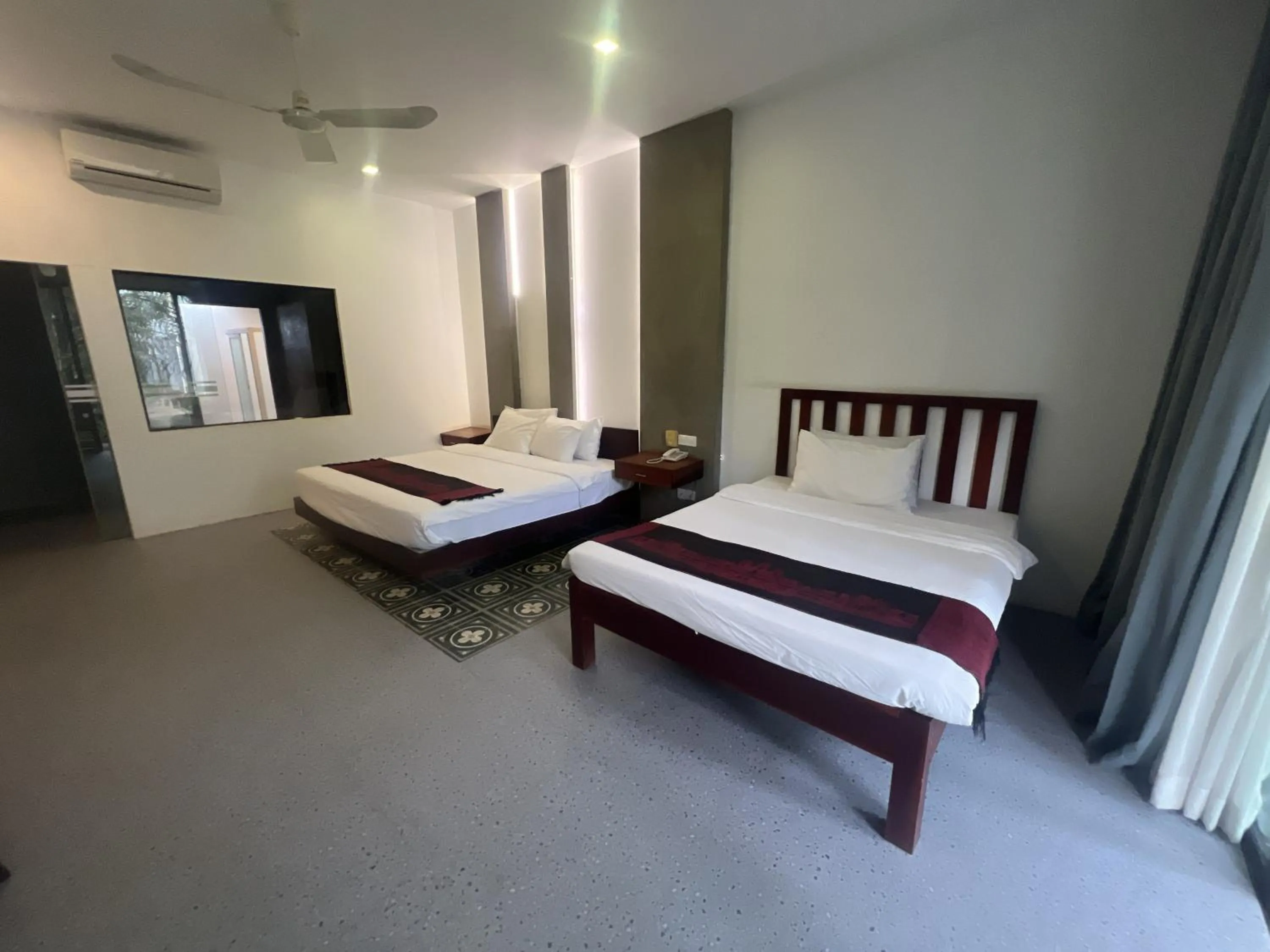 Bed in Tanei Angkor Resort and Spa