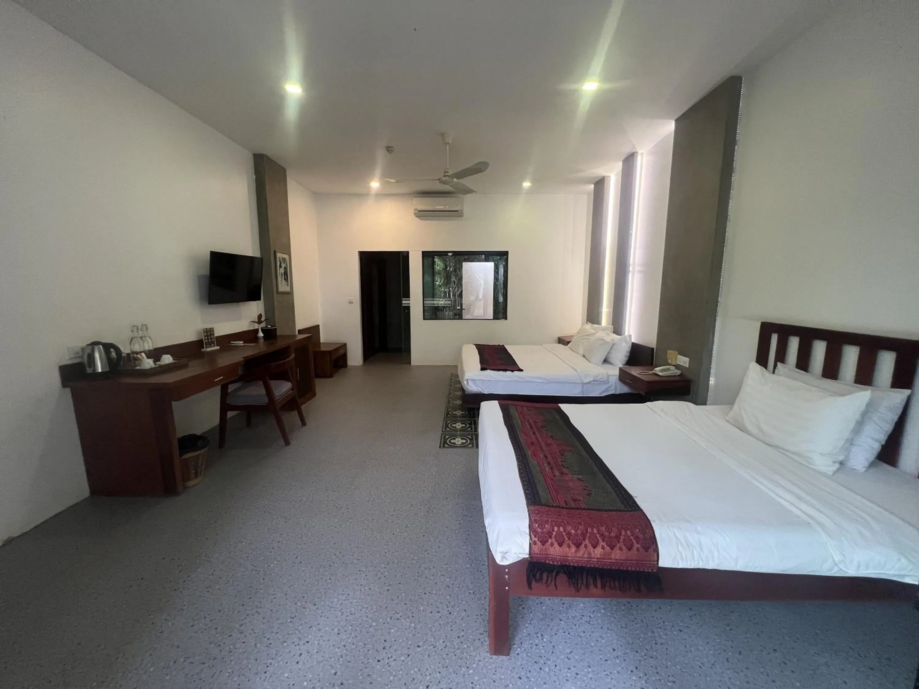 Bed in Tanei Angkor Resort and Spa