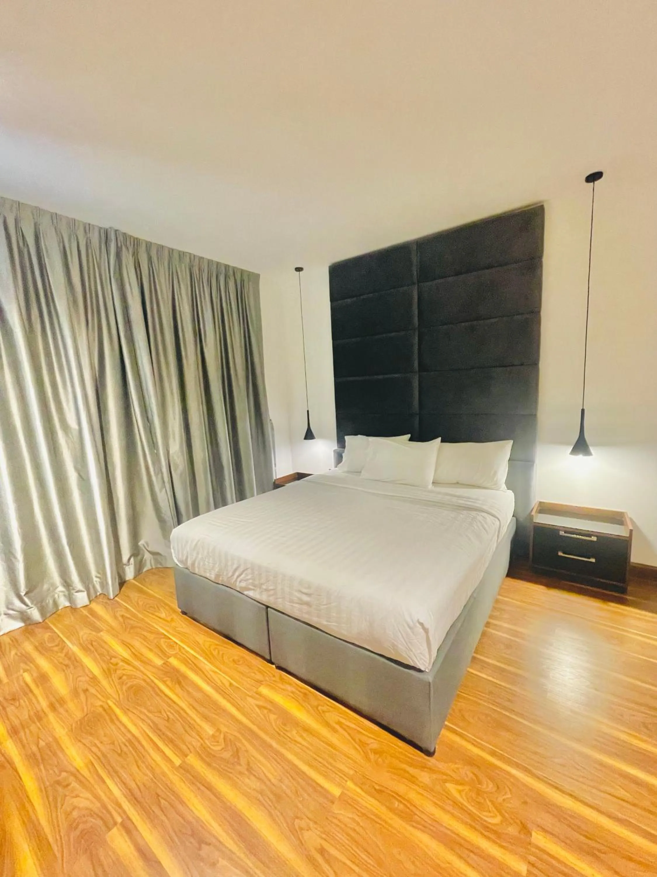 Bed in Kiev Tower Hotel Apartments