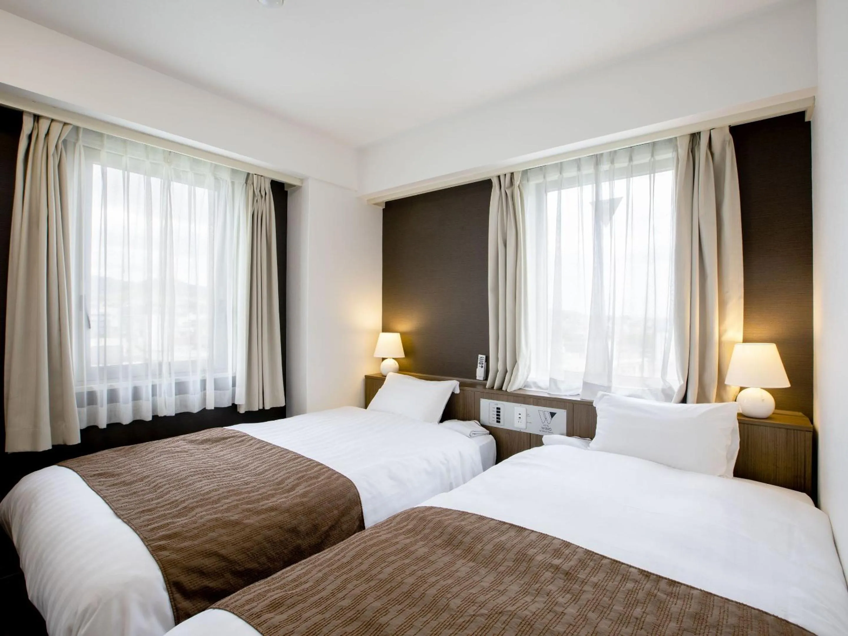 Photo of the whole room, Bed in KOKO STAY Hitachi- formerly Hotel Wing International Hitachi