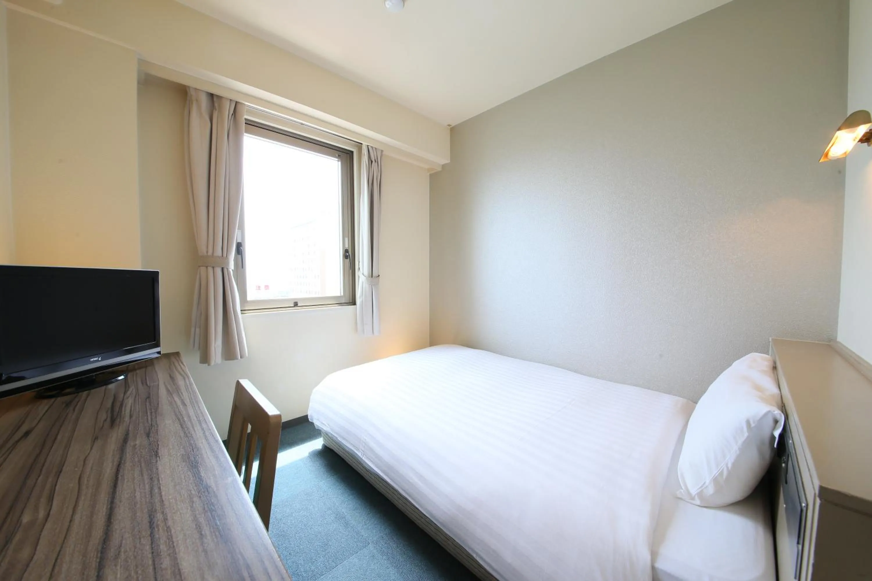 Photo of the whole room, Bed in KOKO STAY Hitachi- formerly Hotel Wing International Hitachi
