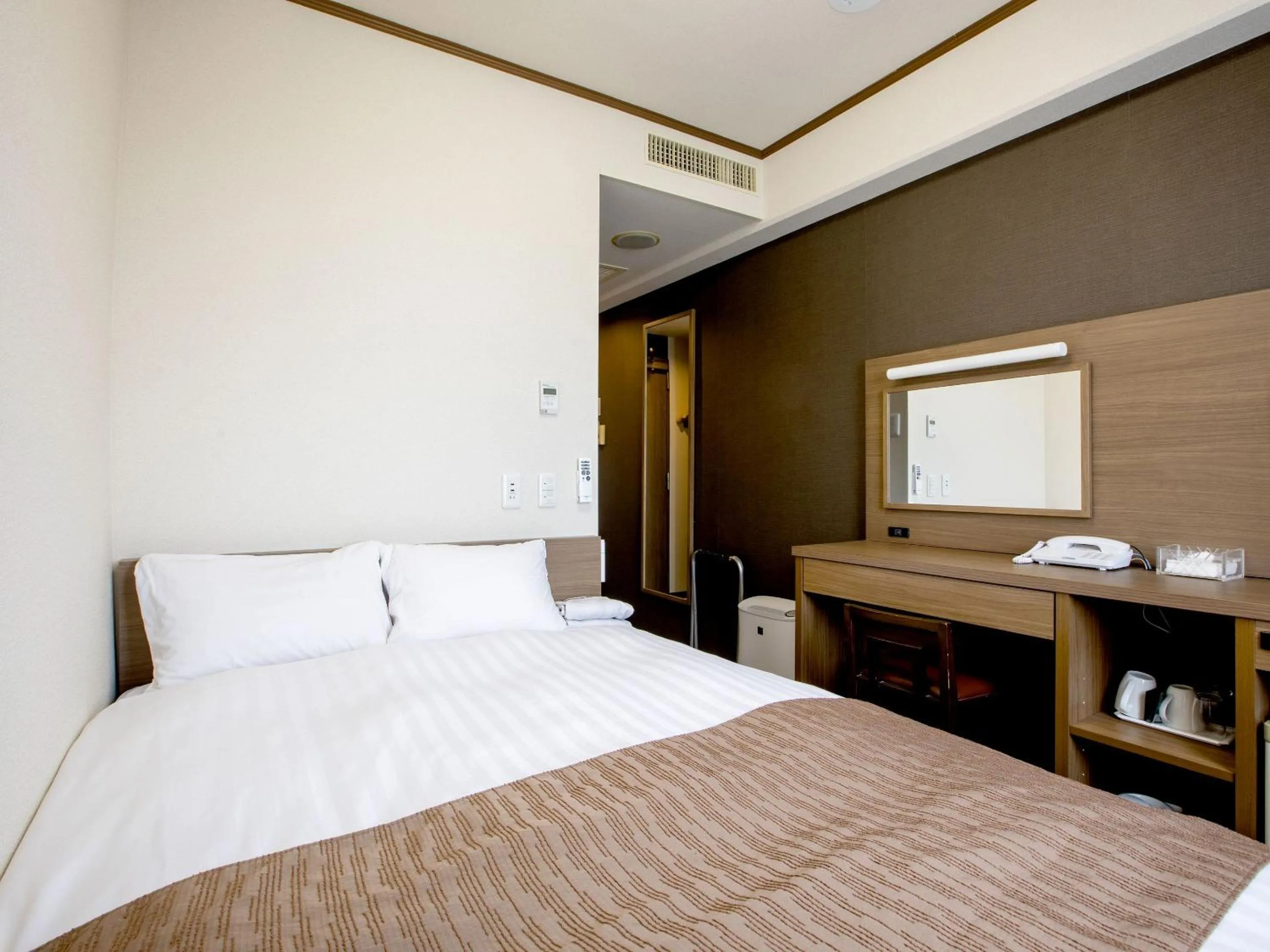 Photo of the whole room, Bed in KOKO STAY Hitachi- formerly Hotel Wing International Hitachi