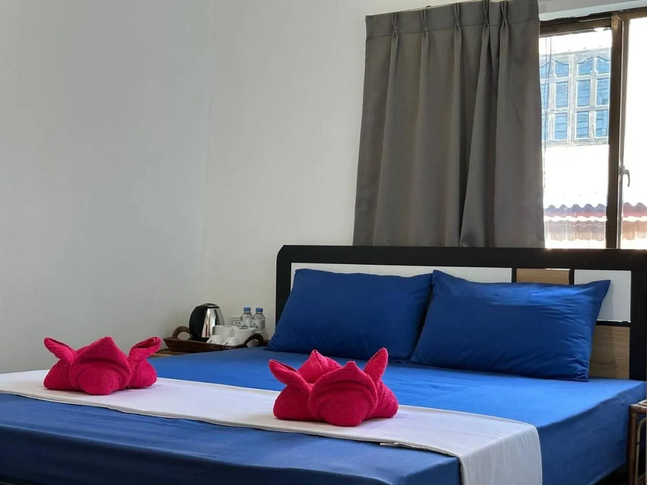 Bed in Happy Elephant Bungalows