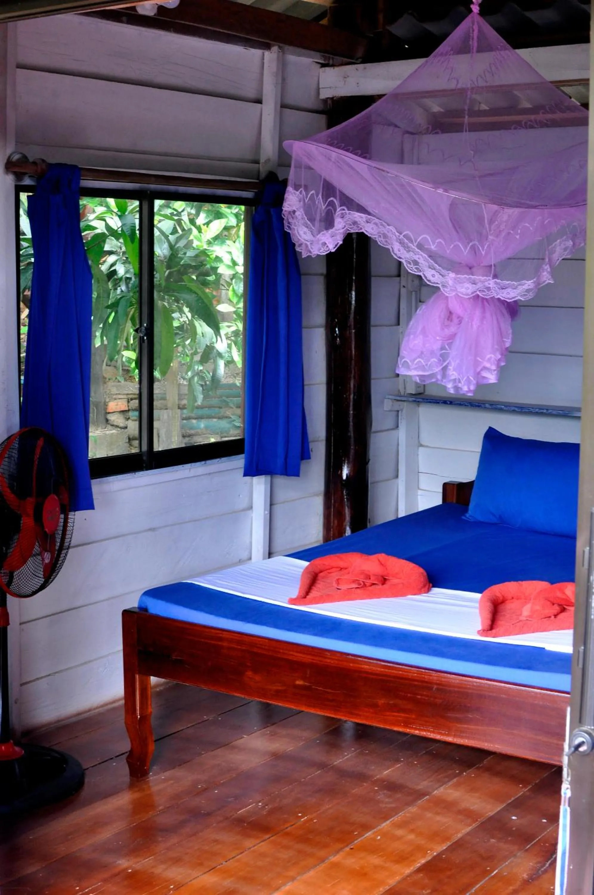 Bed in Happy Elephant Bungalows