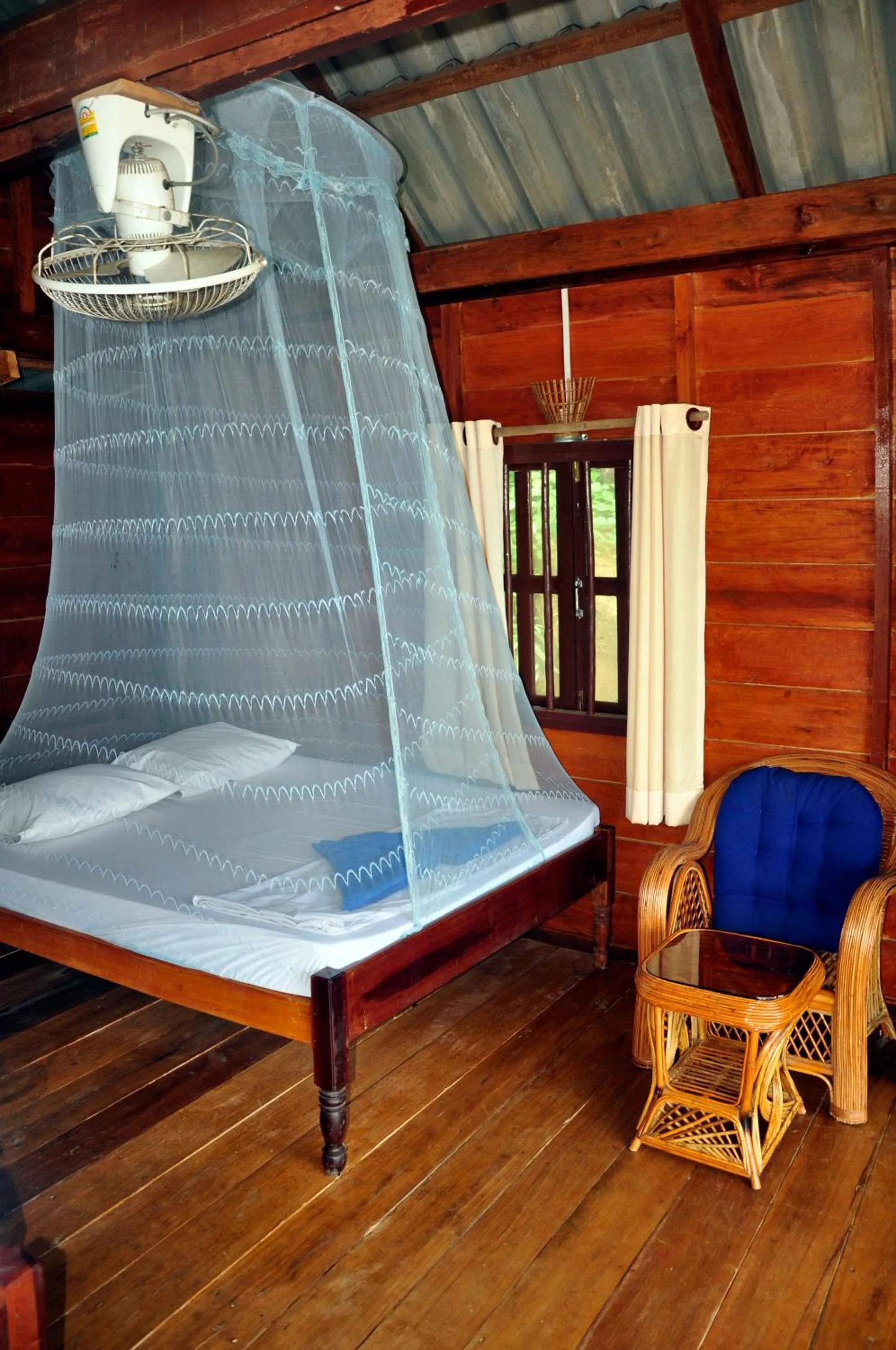 Bed in Happy Elephant Bungalows