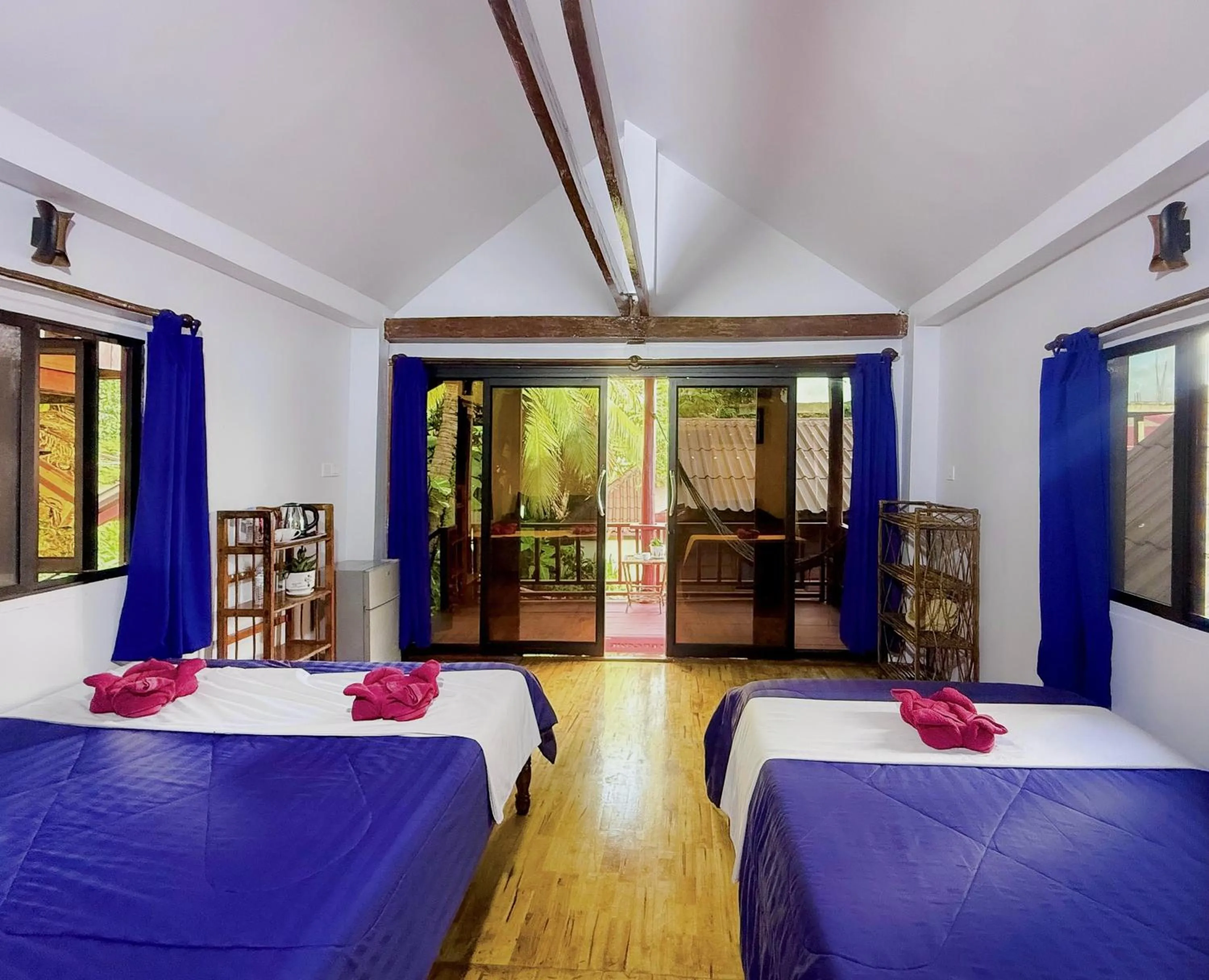 Bed in Happy Elephant Bungalows