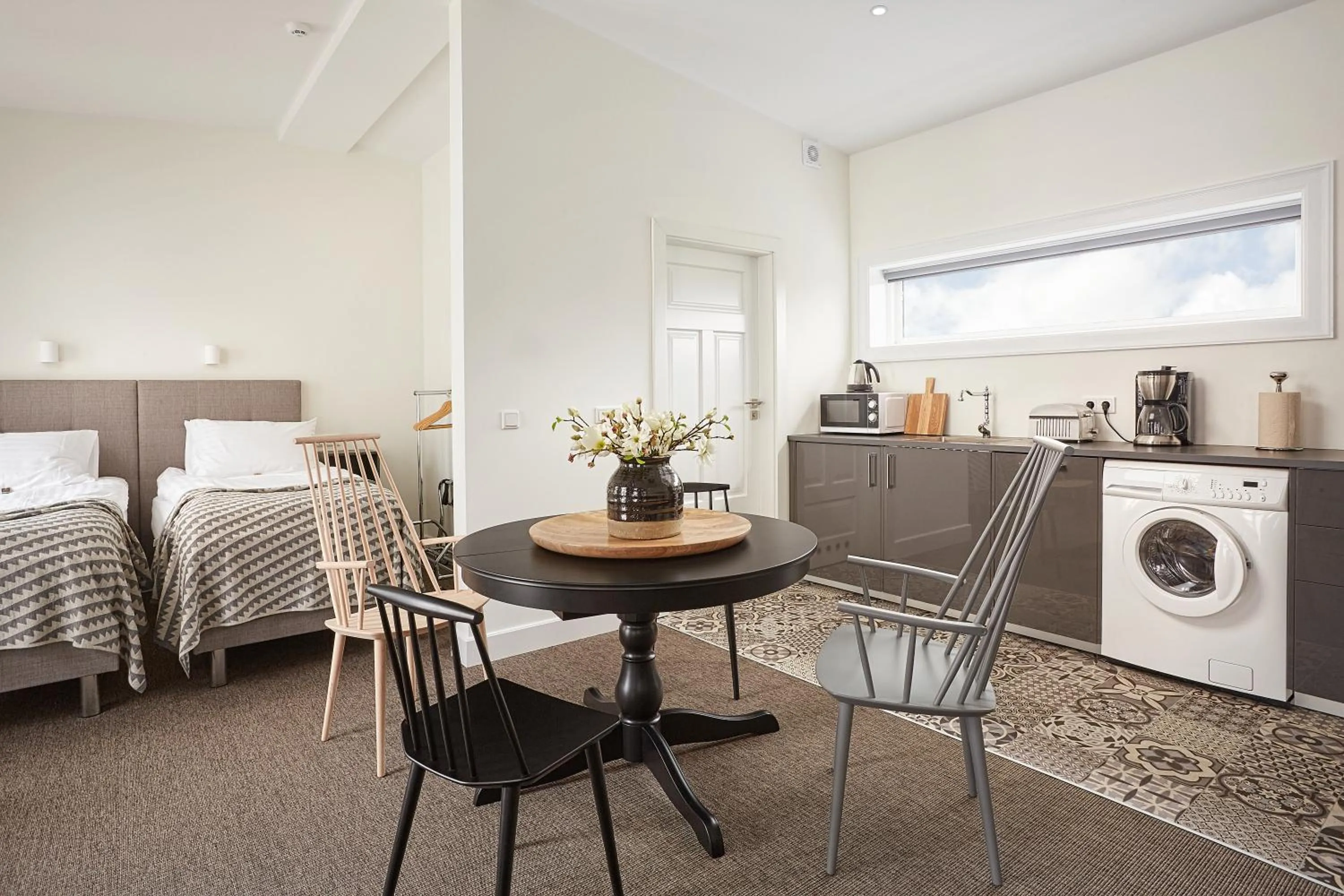 Dining area, Bed in Ice Apartments Reykjavik by Heimaleiga