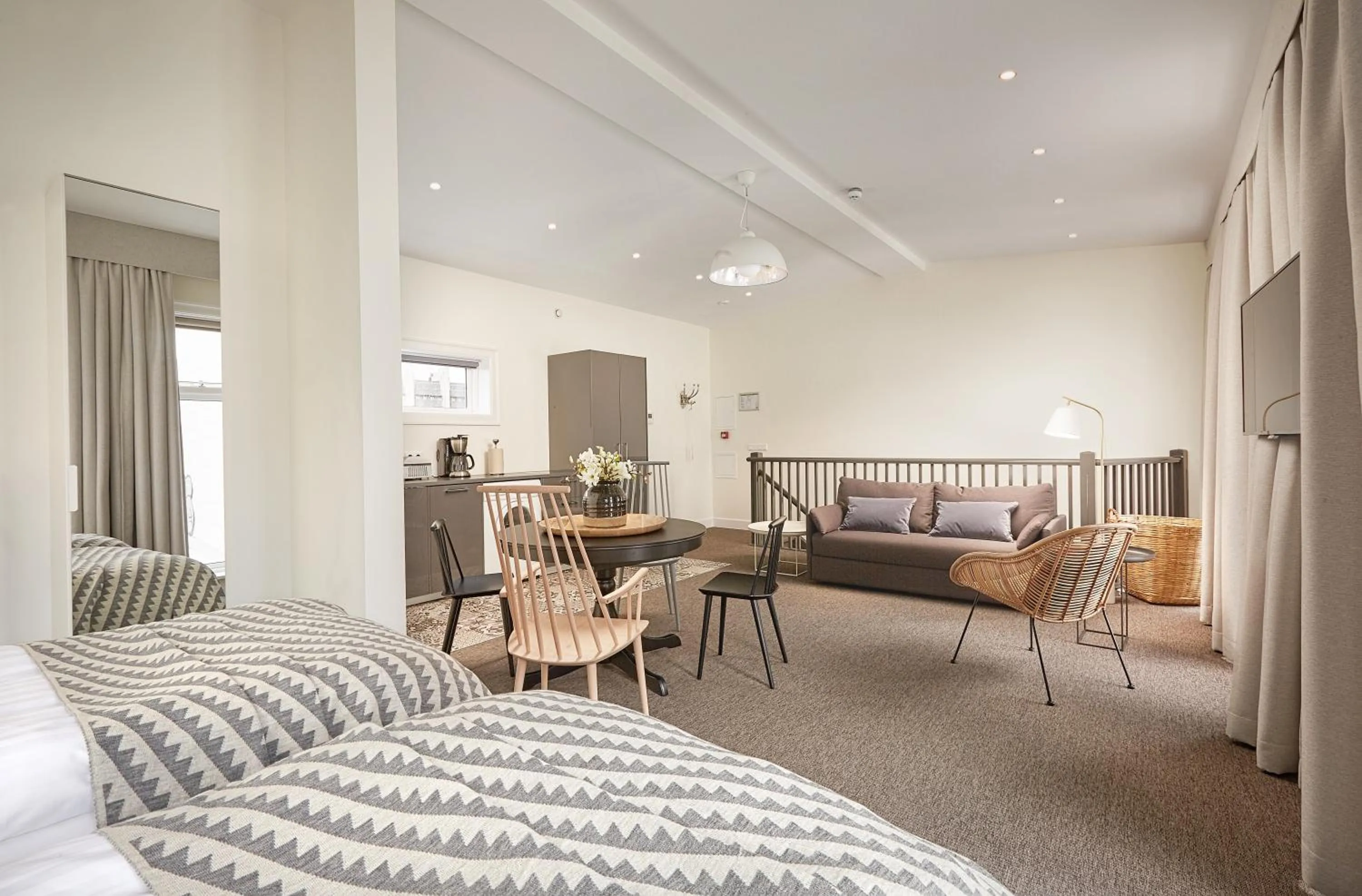 Living room, Bed in Ice Apartments Reykjavik by Heimaleiga