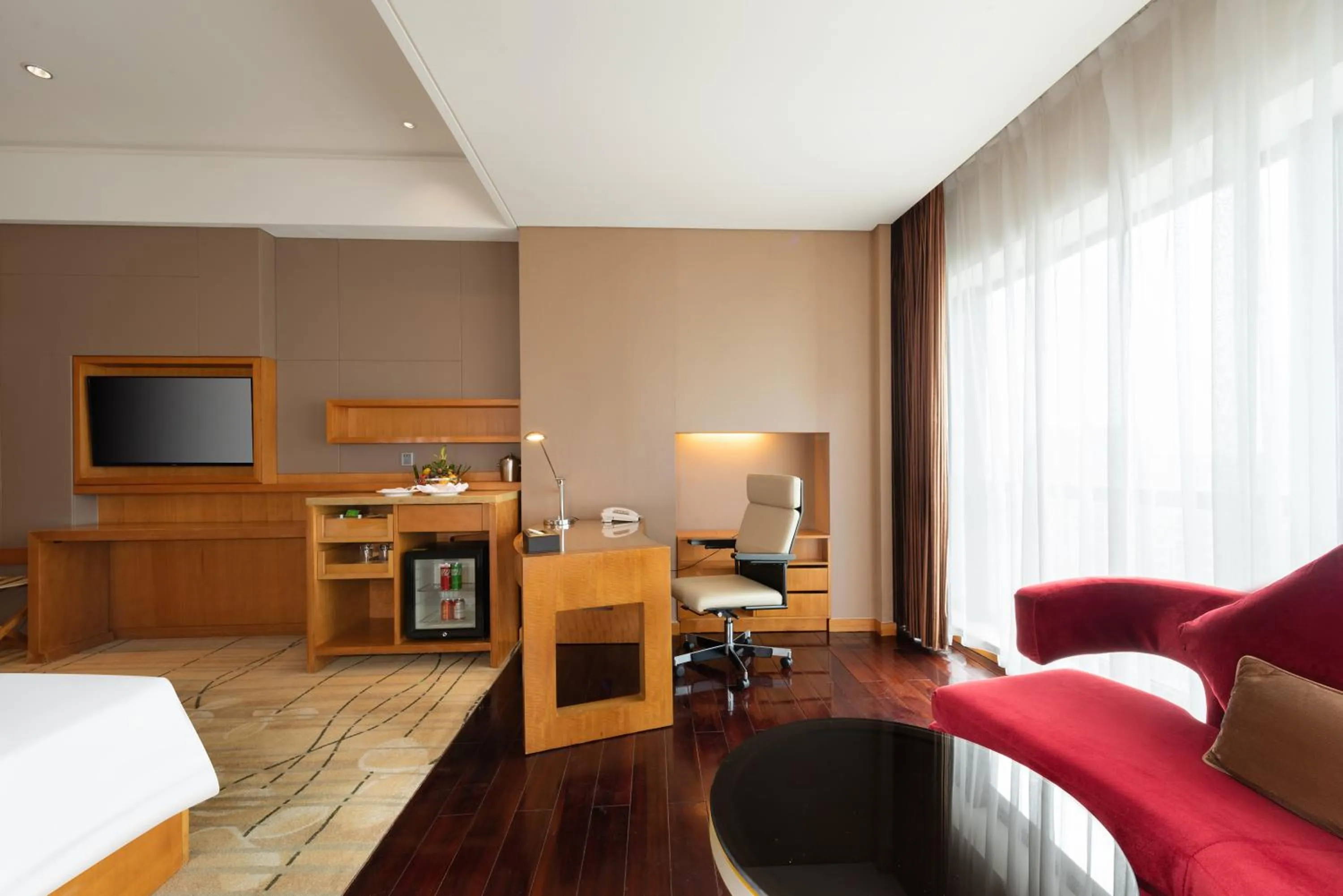 Seating area, Bed in Wyndham Putian Downtown