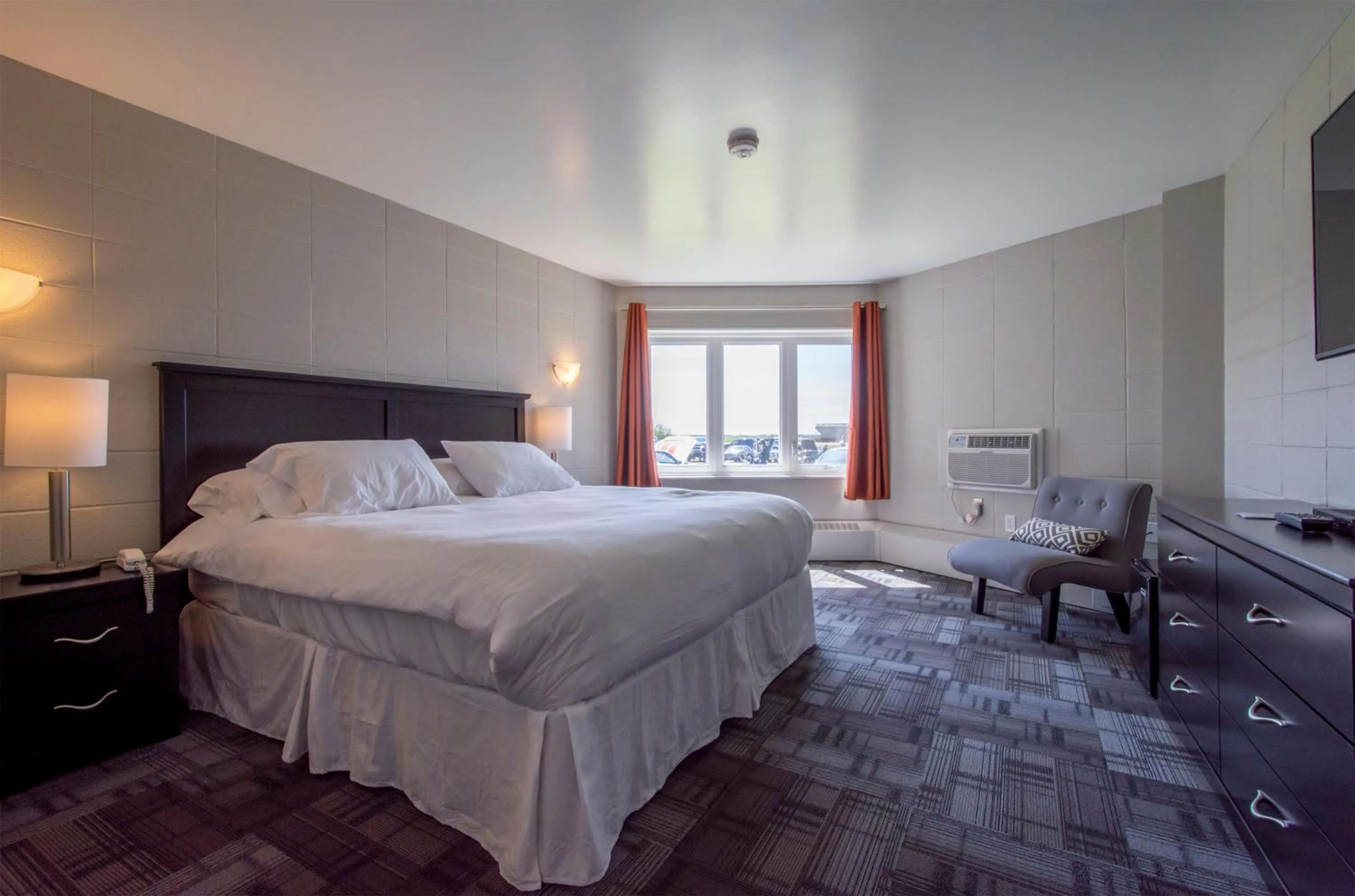 Bedroom in Grand Marshal Inn