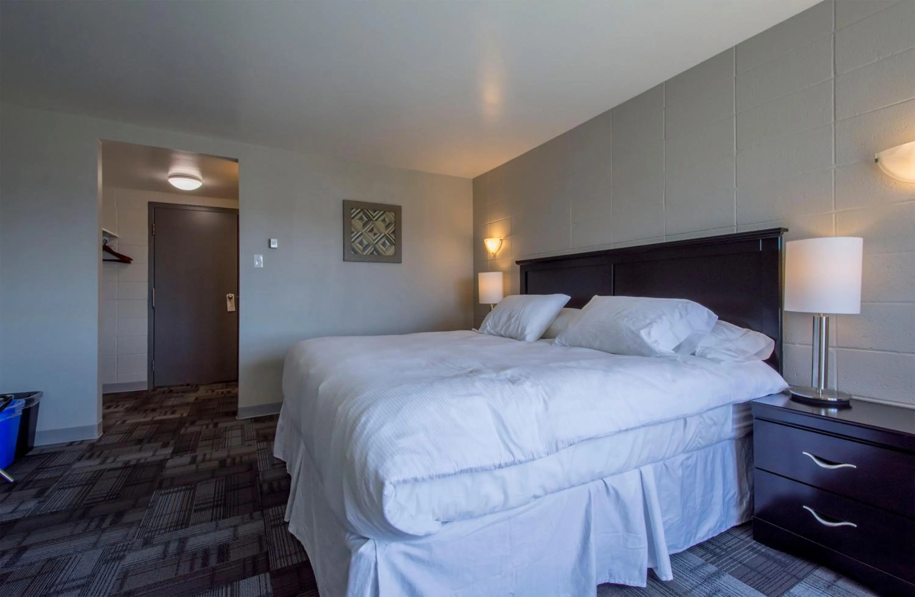 Bedroom in Grand Marshal Inn