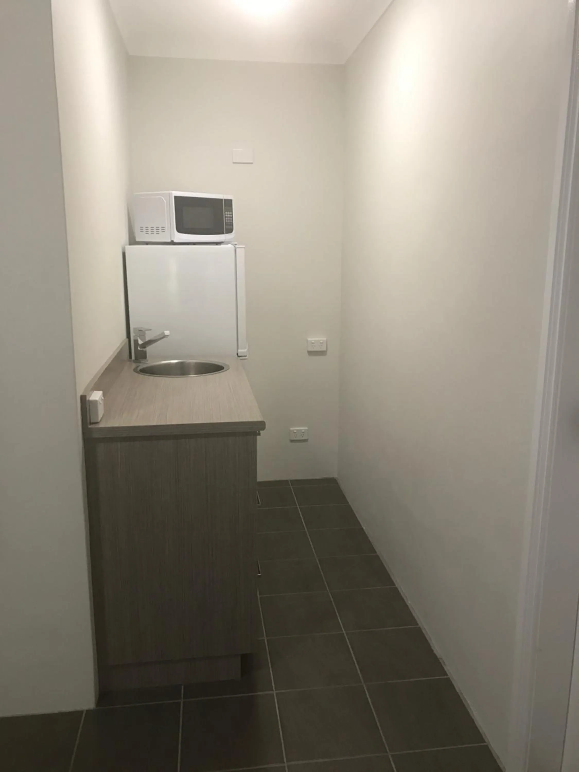 Kitchen or kitchenette in Acacia Motor Lodge