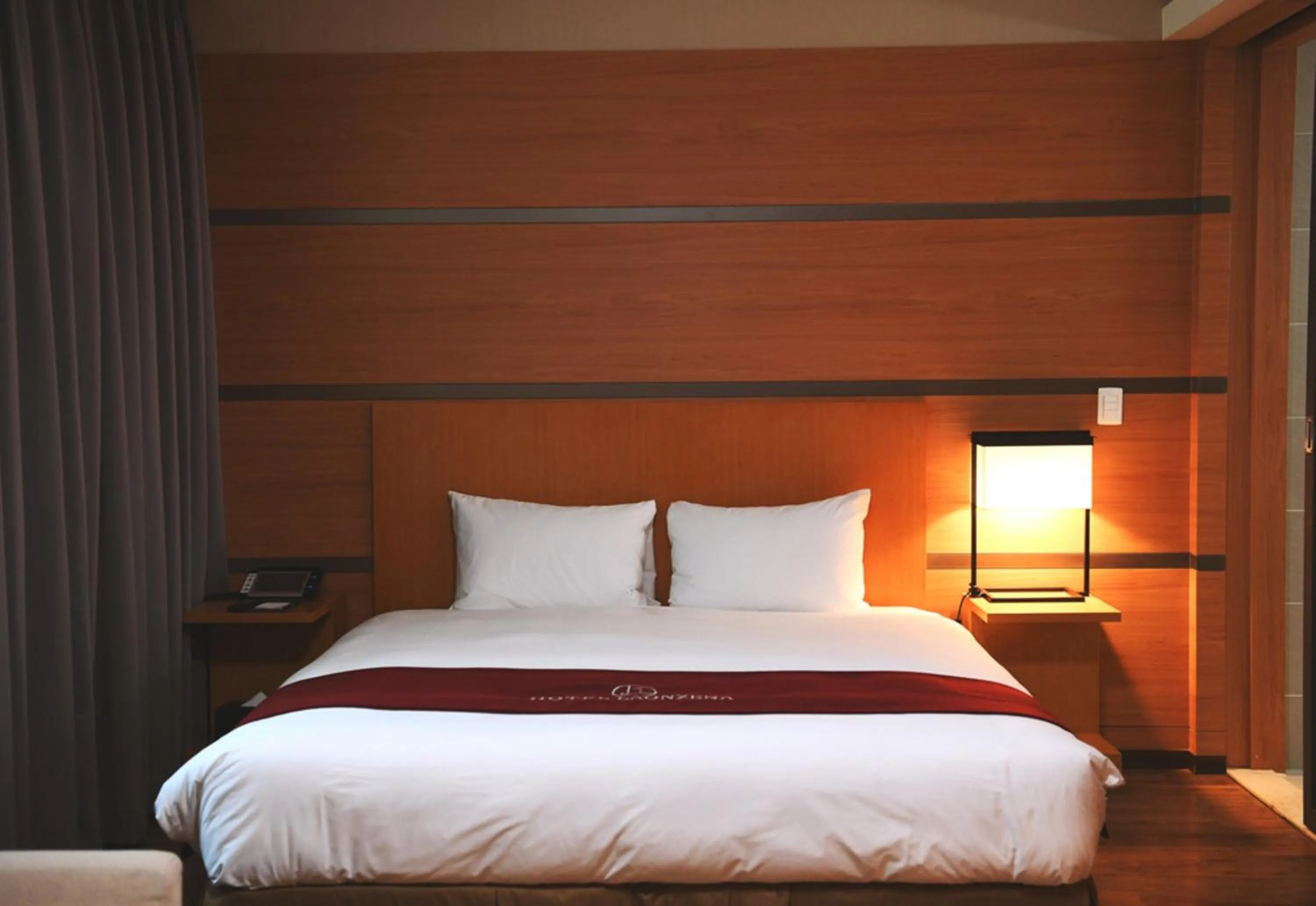 Bed in Hotel Laonzena