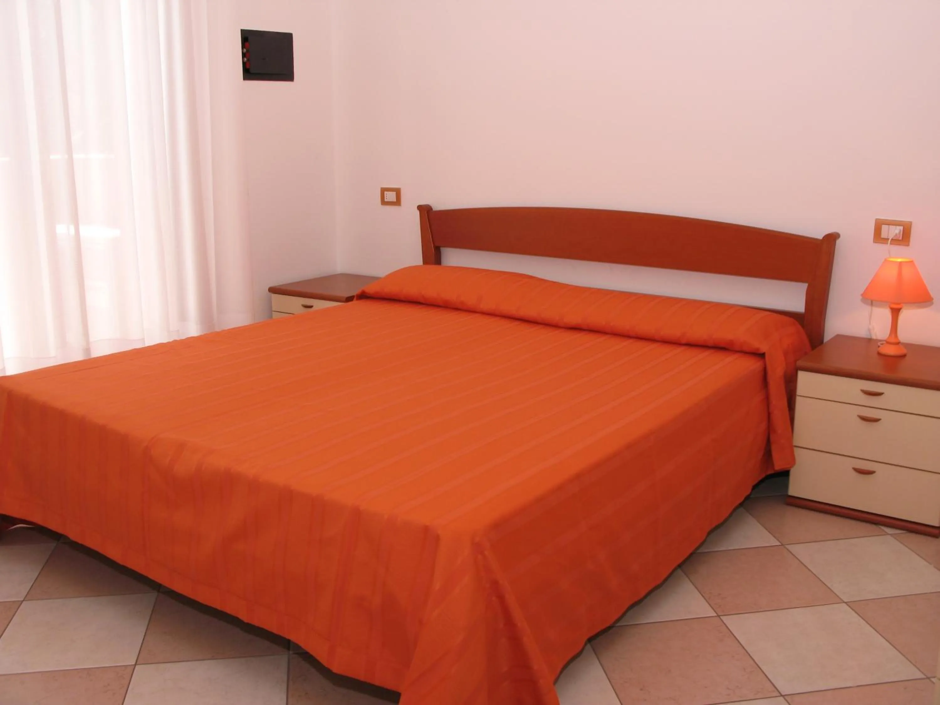 Bedroom in Family Apartments Residence Trieste