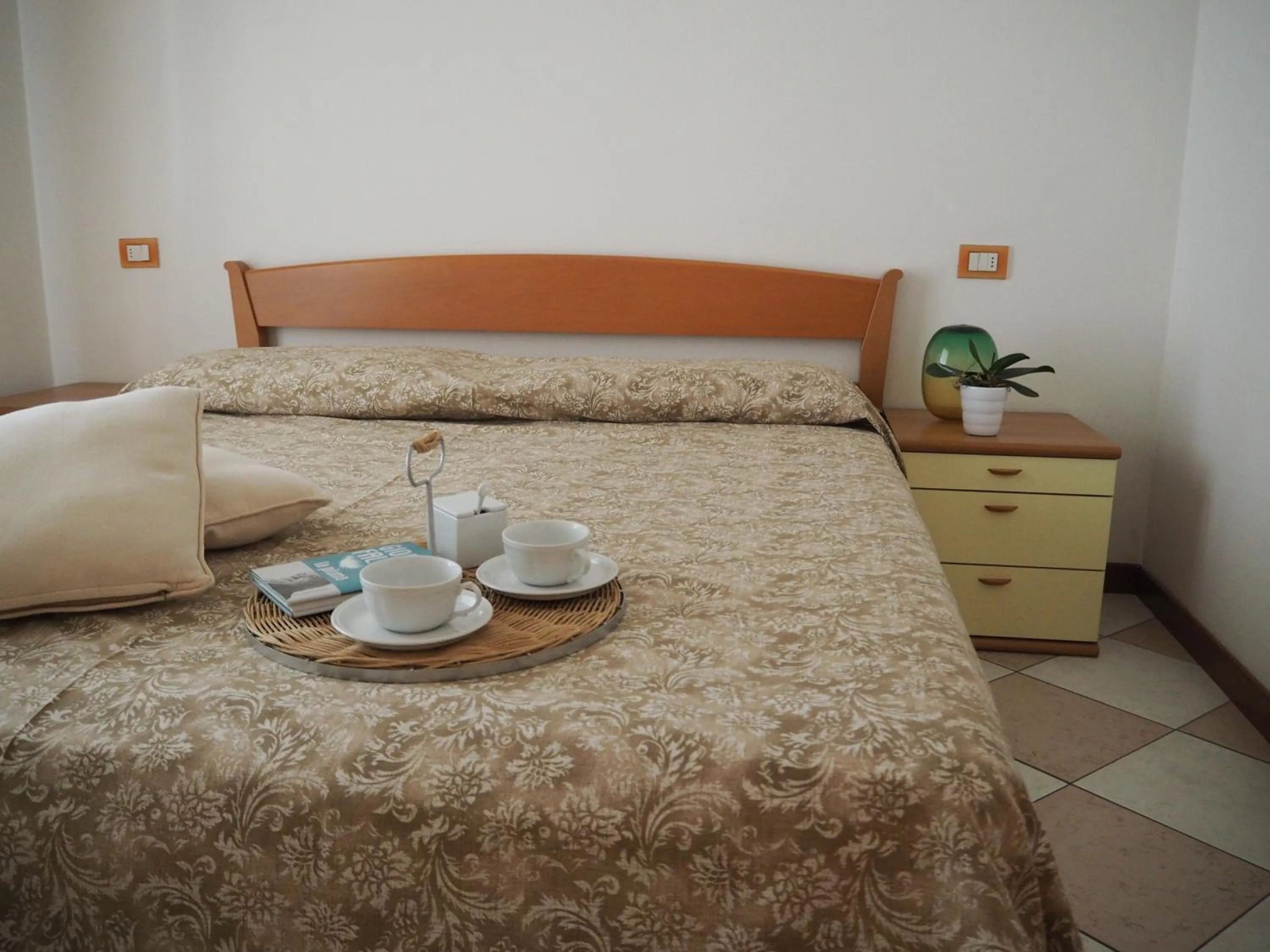 Bed in Family Apartments Residence Trieste