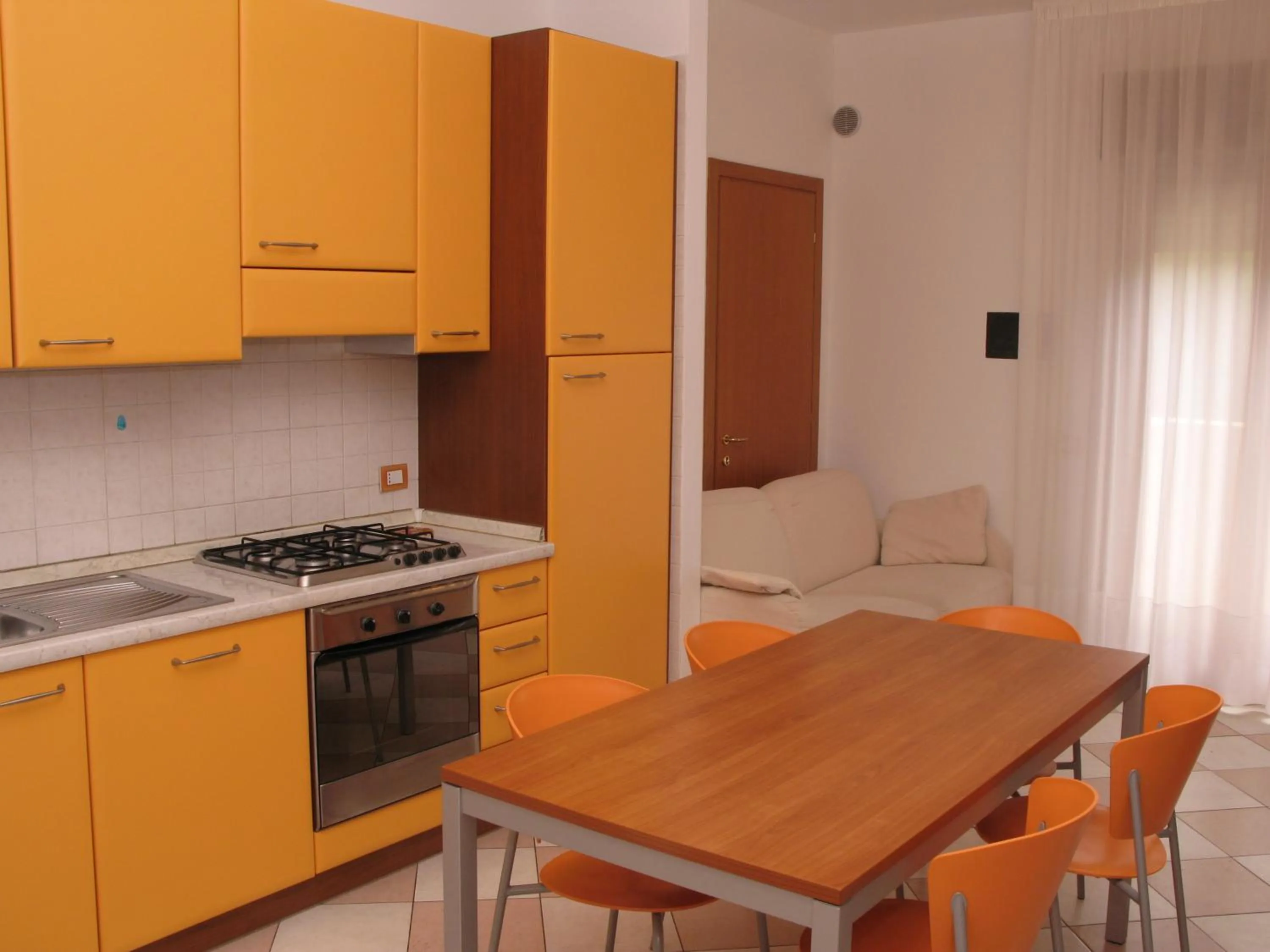 Dining area in Family Apartments Residence Trieste