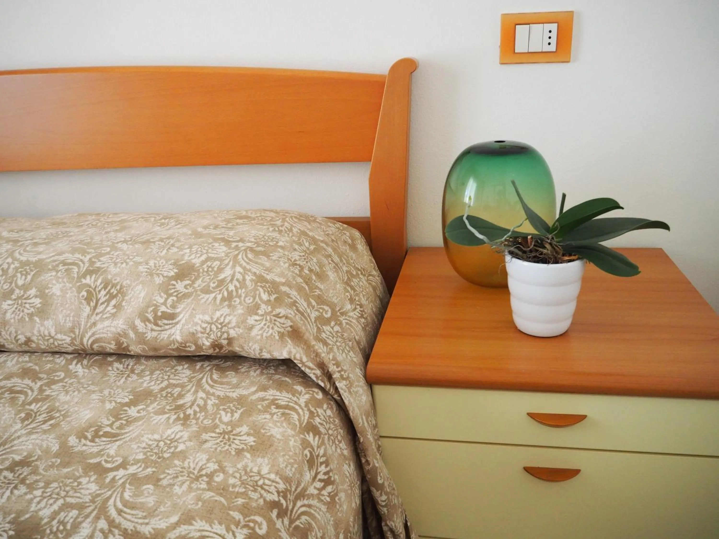 Bed in Family Apartments Residence Trieste