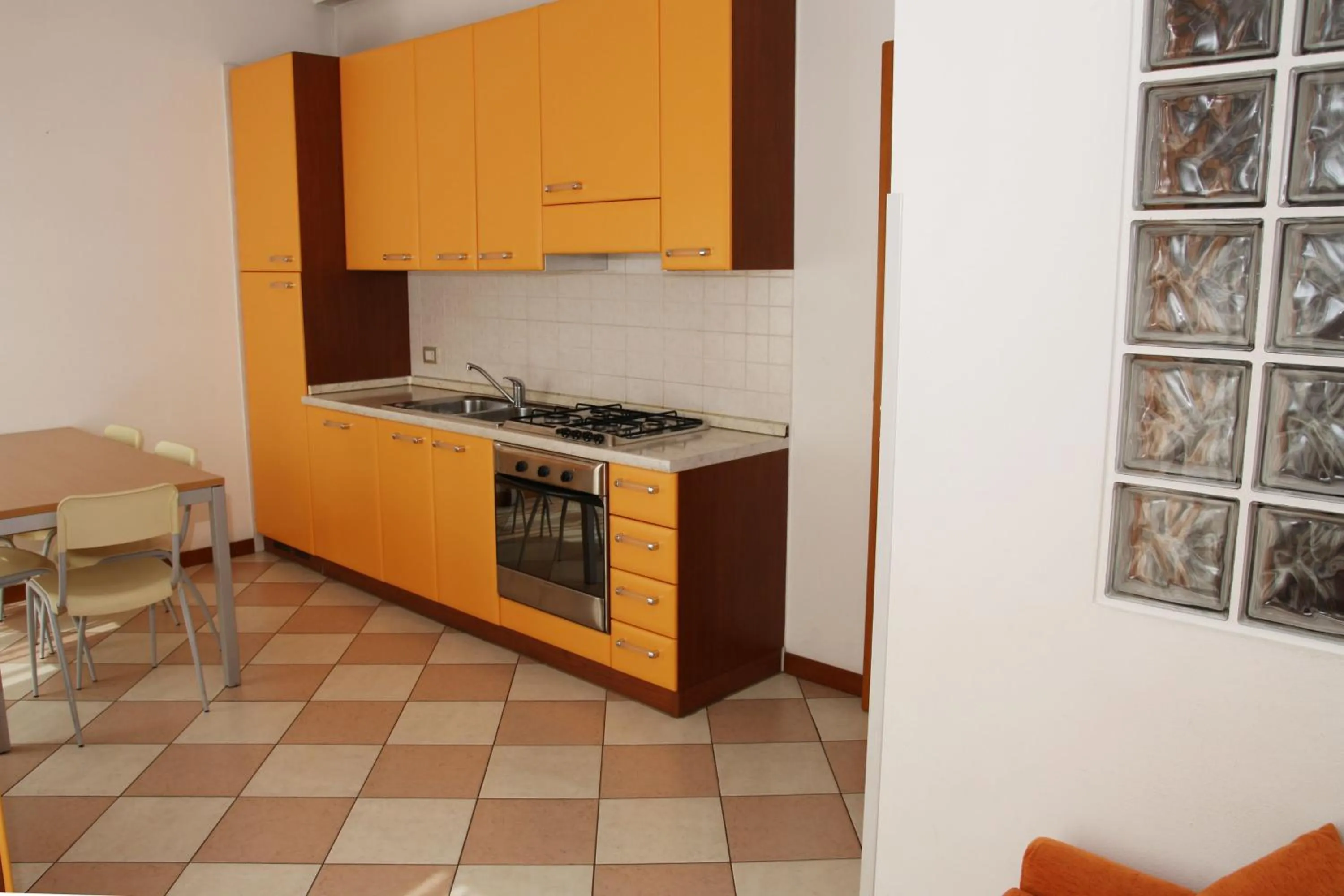 Kitchen or kitchenette in Family Apartments Residence Trieste