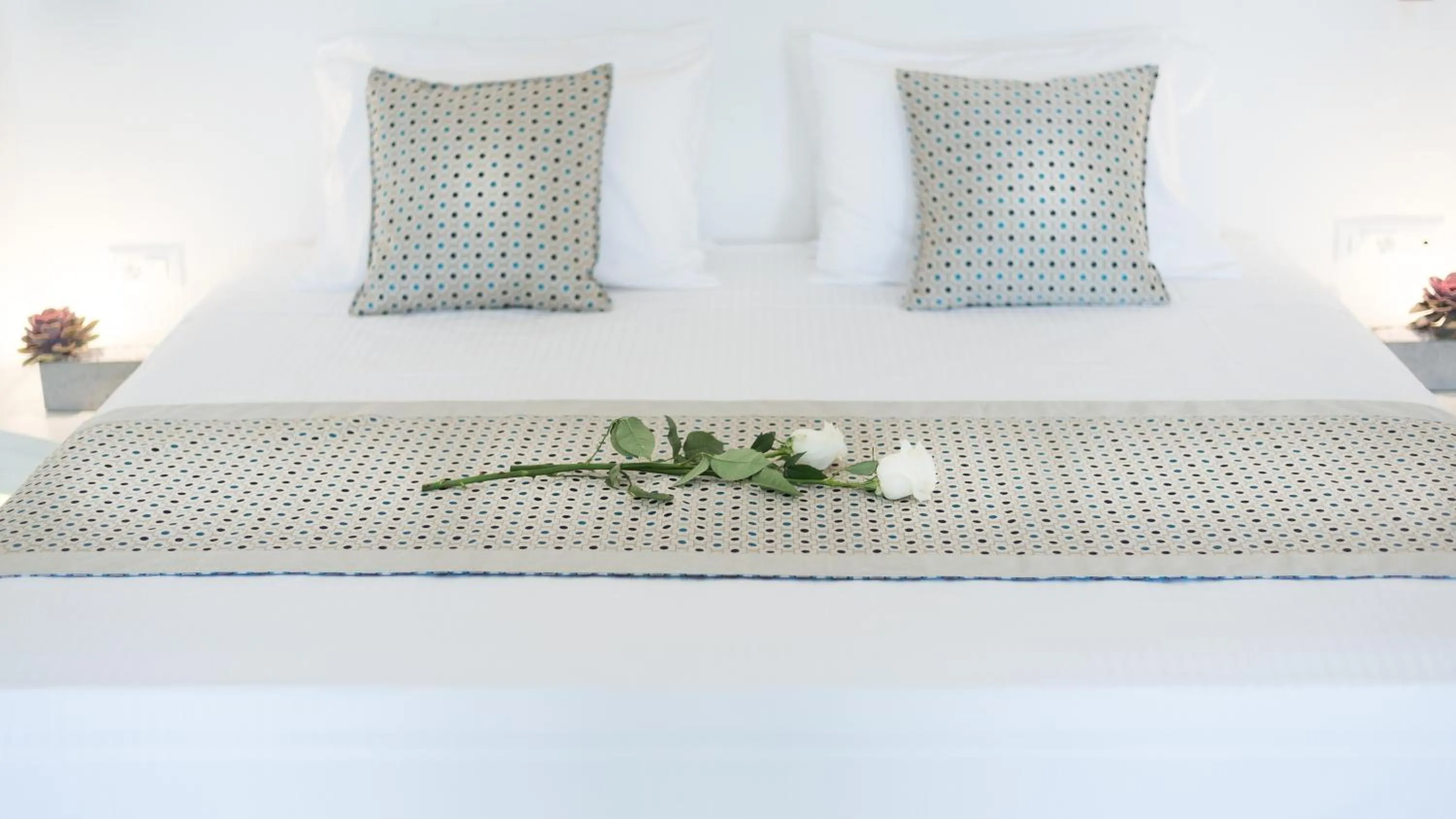 Bed in Maregio Suites