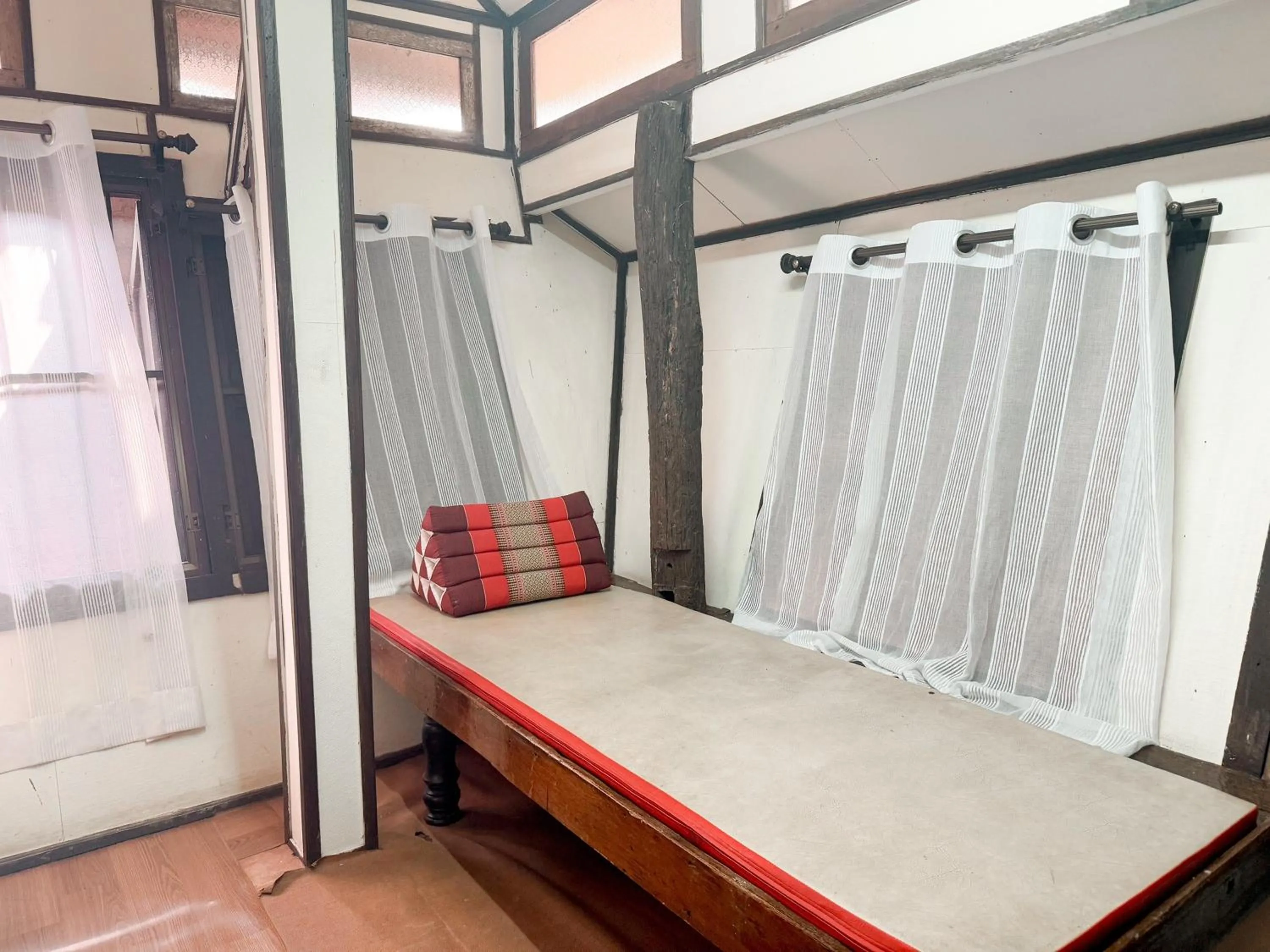 Photo of the whole room, Bed in Monfai Culture House