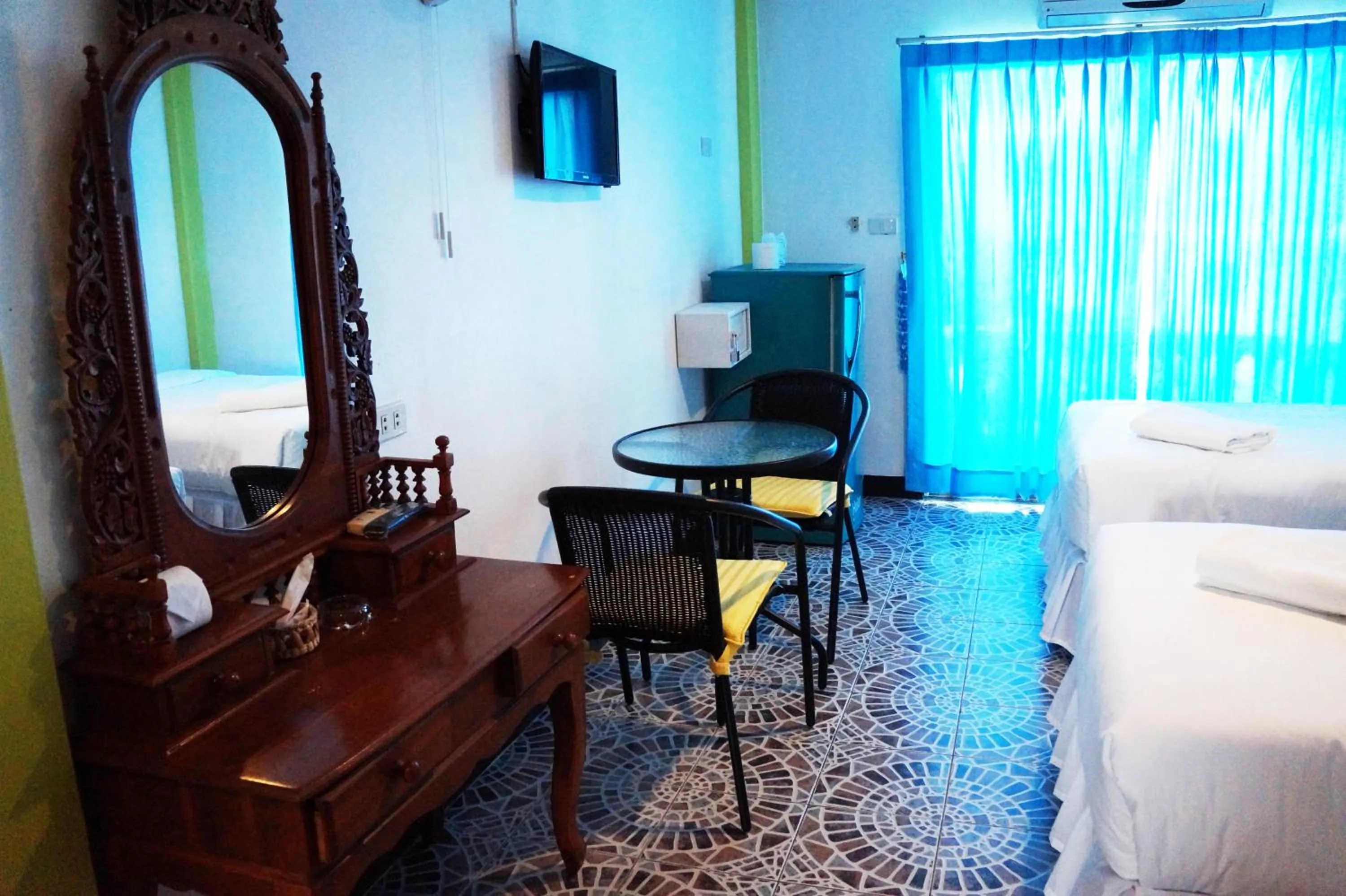 Seating area, Bed in Nong Guest House