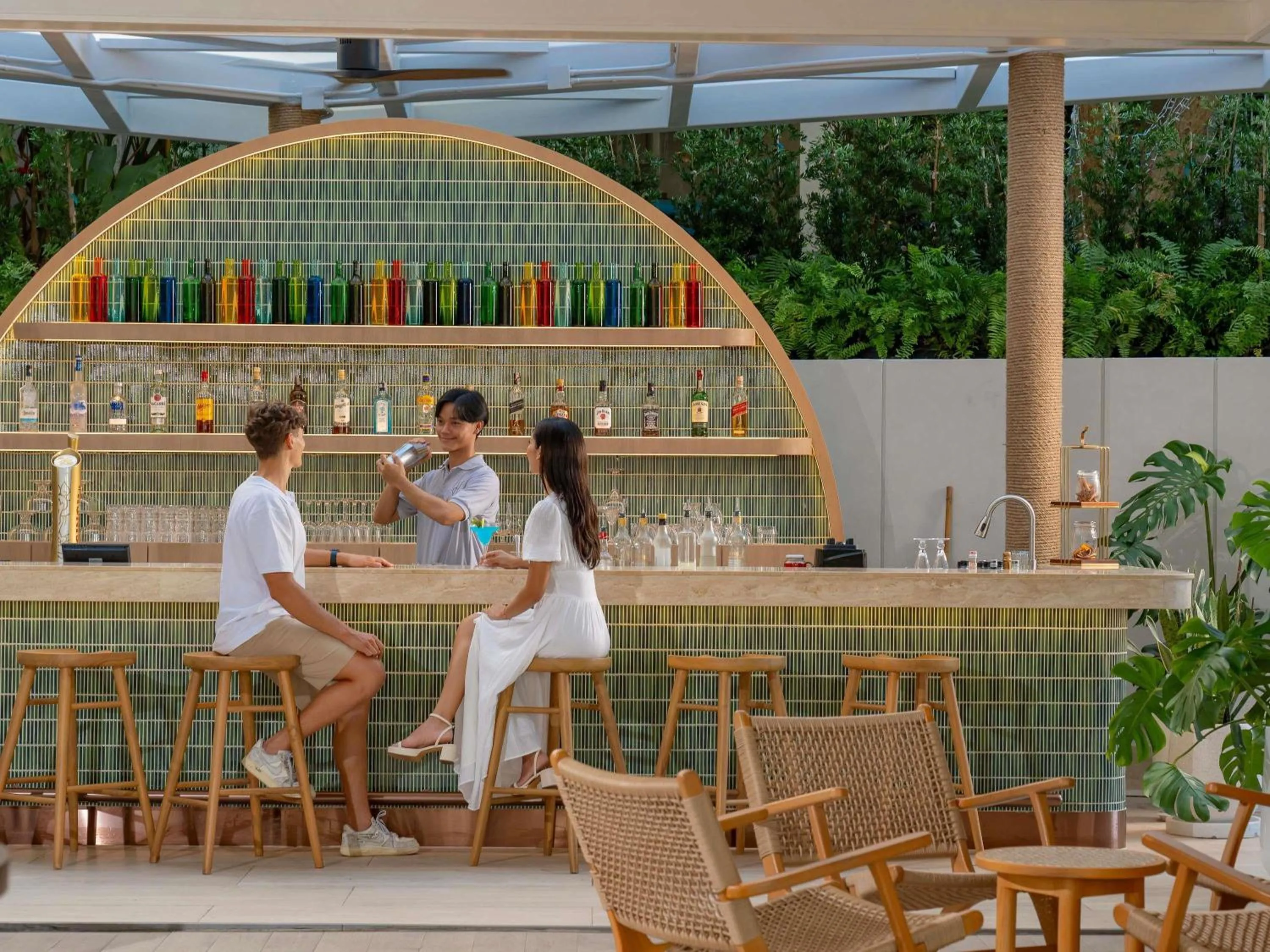 Lounge or bar in Andaman Beach Hotel Phuket - Handwritten Collection by Accor