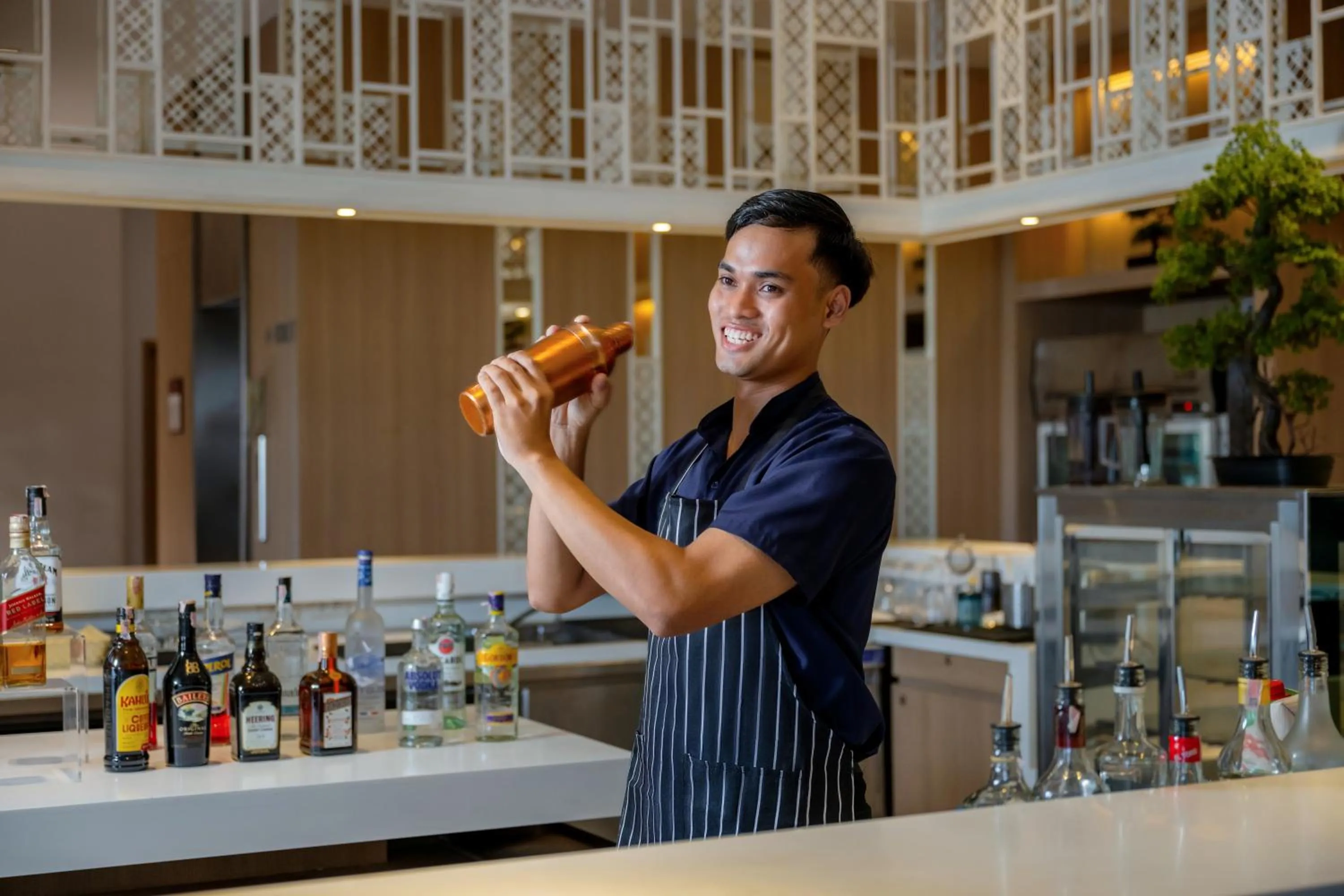 Lounge or bar in Andaman Beach Hotel Phuket - Handwritten Collection