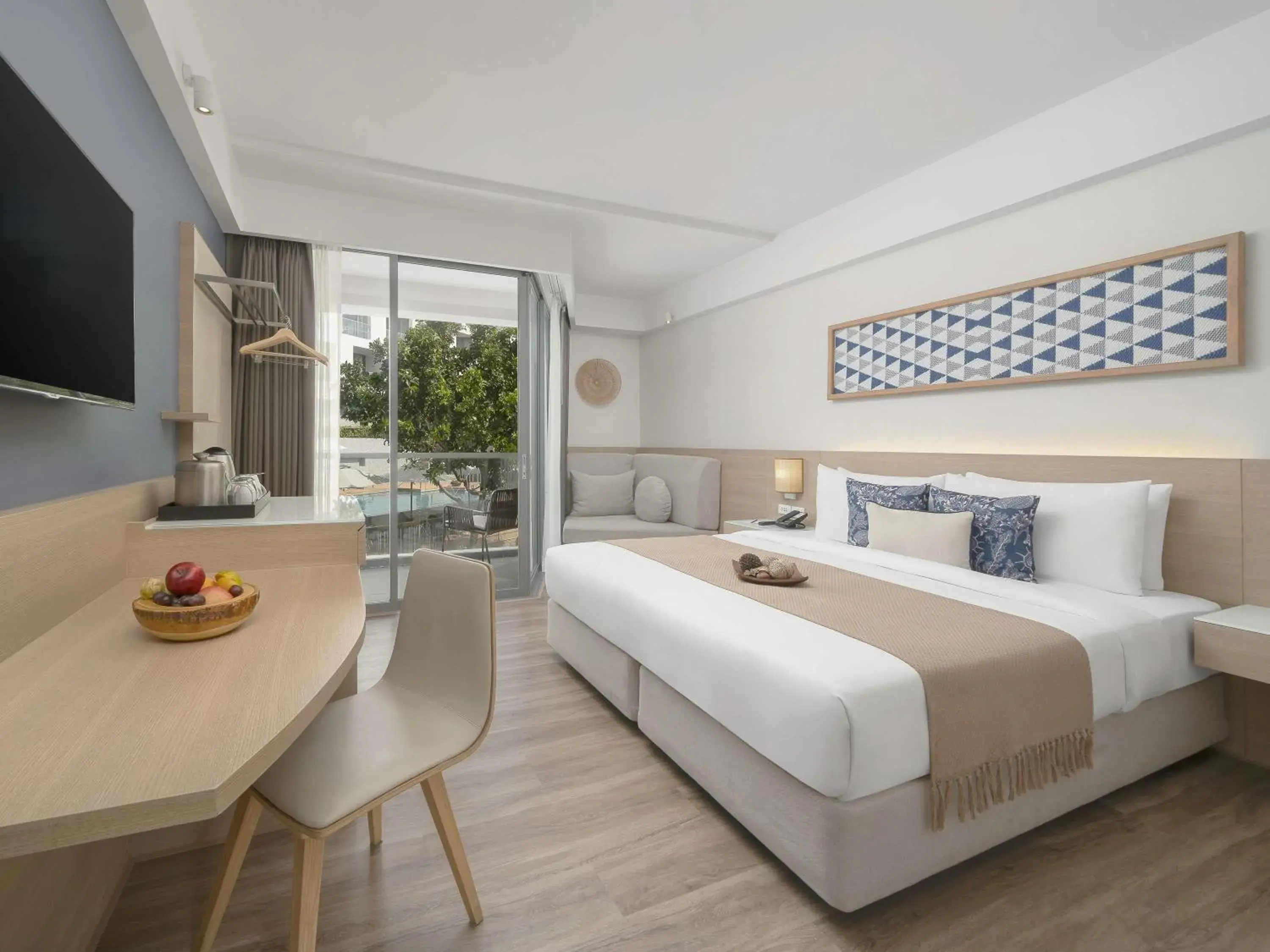 Superior King Room with Balcony and Pool View in Andaman Beach Hotel Phuket - Handwritten Collection Superior King Room with Balcony and Pool View in Andaman Beach Hotel Phuket - Handwritten Collection