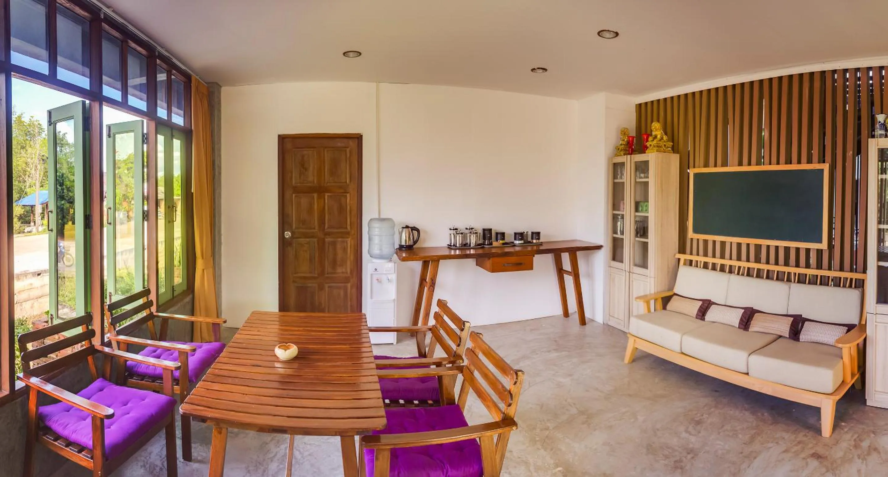 Seating area in Tonmai Suites