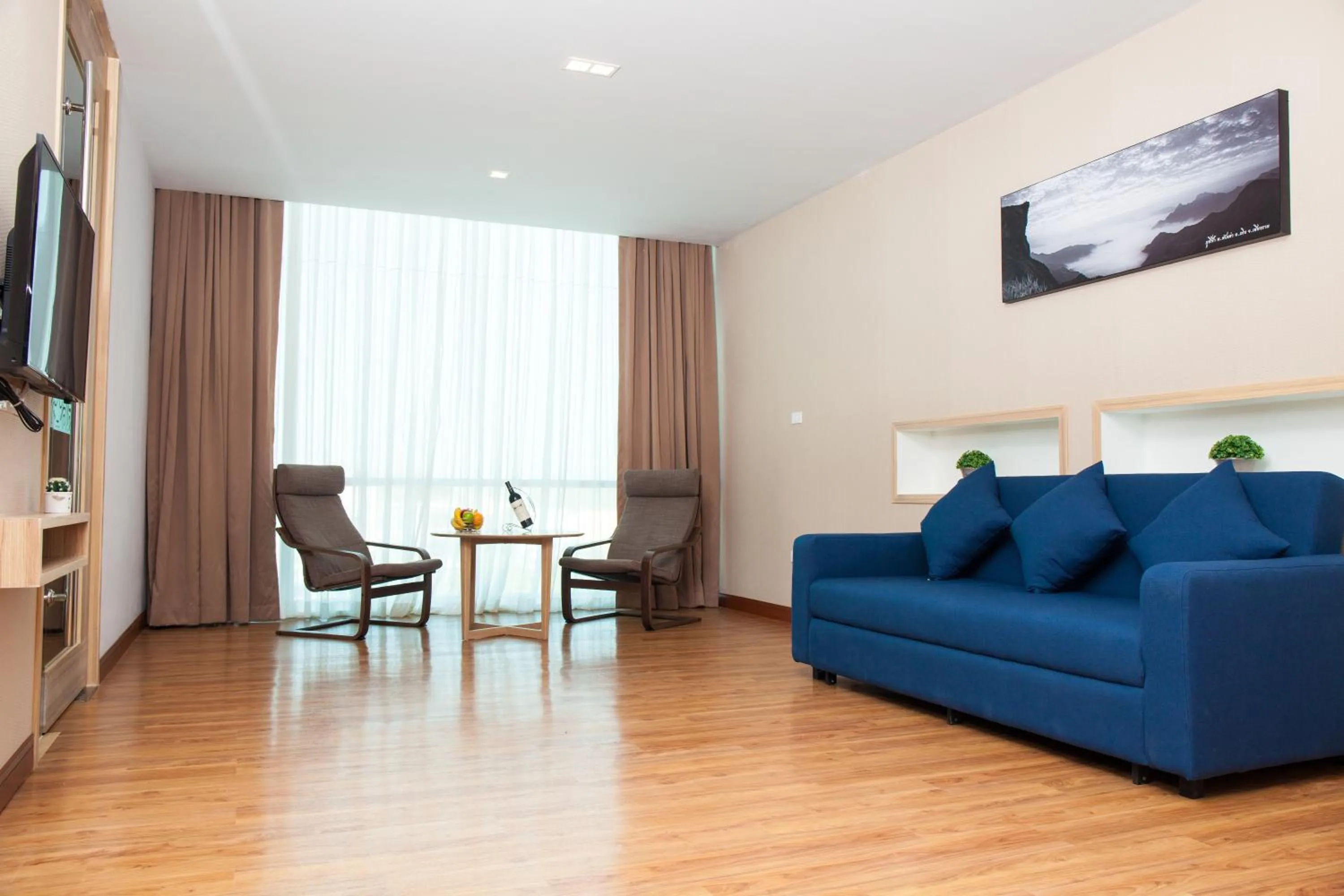 Living room in Grand Vista Hotel Chiangrai