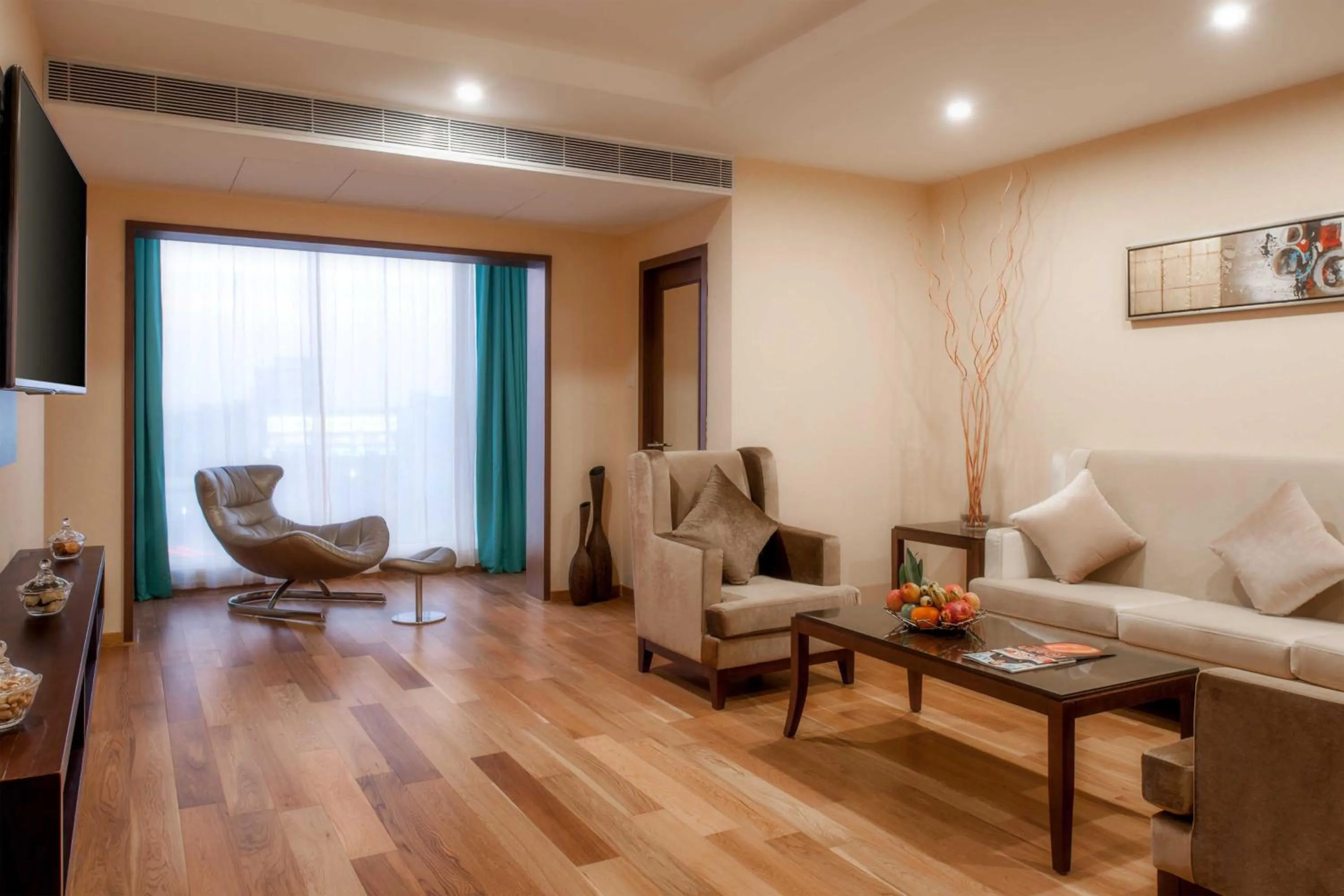 Living room in Days Hotel by Wyndham Chennai OMR