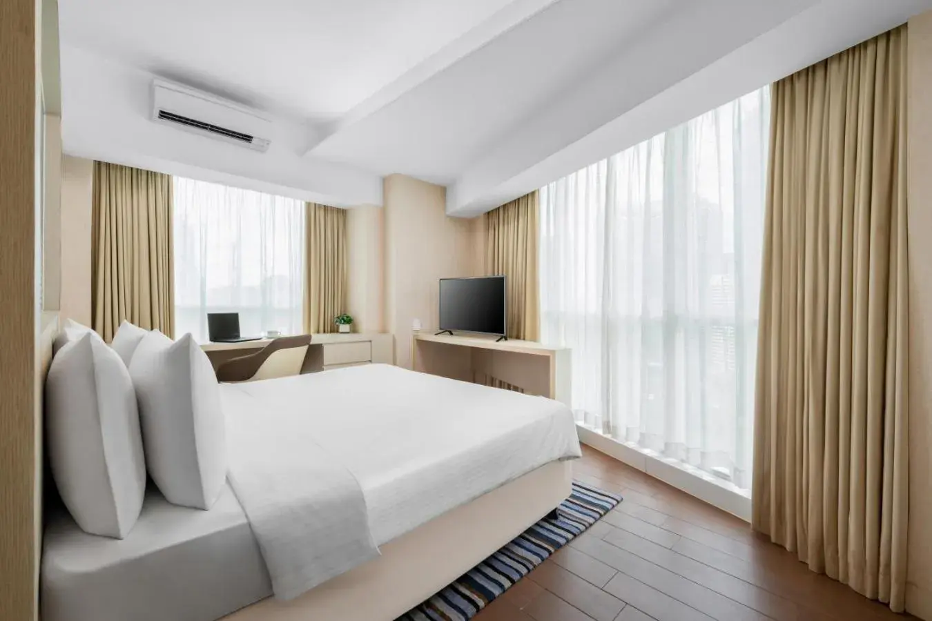 One-Bedroom Suite in Oasia Suites Kuala Lumpur by Far East Hospitality One-Bedroom Suite in Oasia Suites Kuala Lumpur by Far East Hospitality