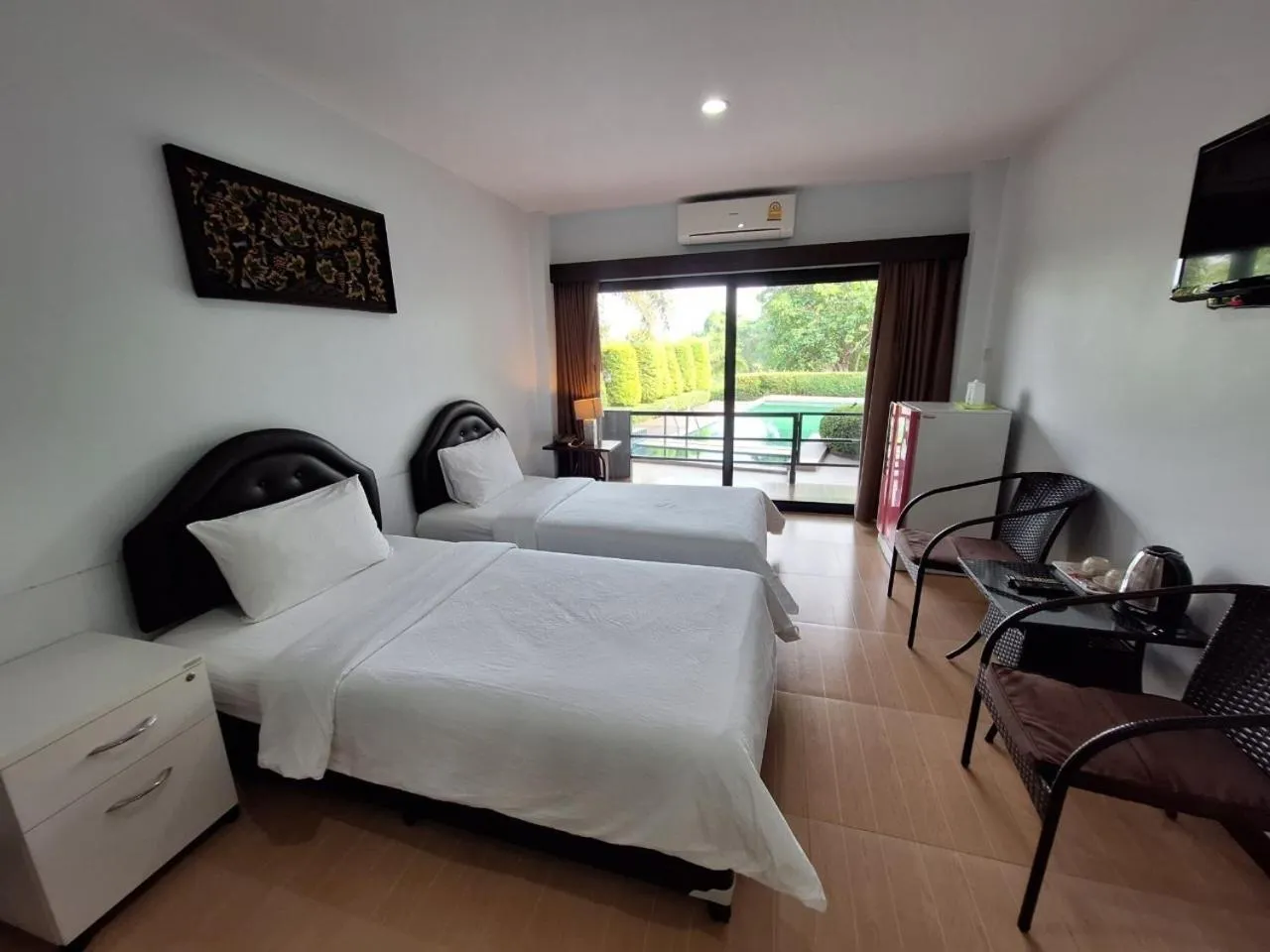 Photo of the whole room, Bed in Evergreen Resort Chanthaburi