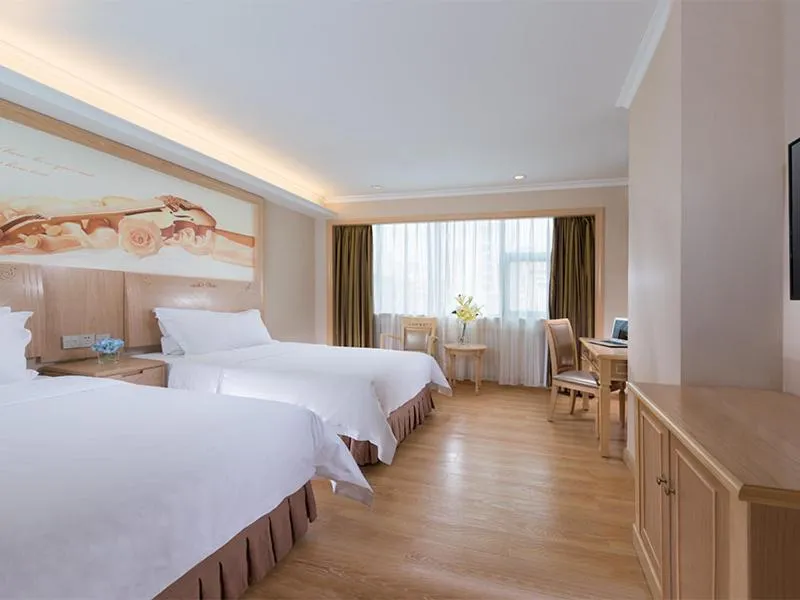 Bed in Vienna Hotel Shenzhen Haiwan