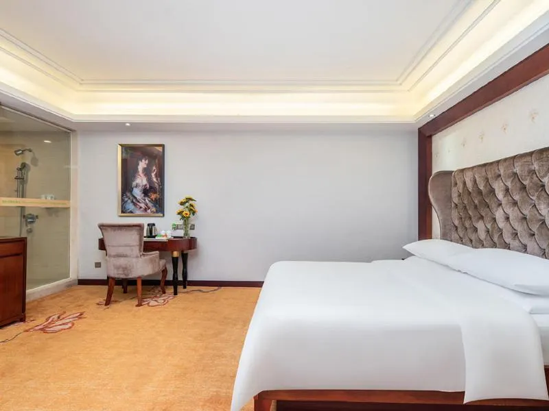 Bed in Vienna Hotel Dongguan Humen Wanda Plaza