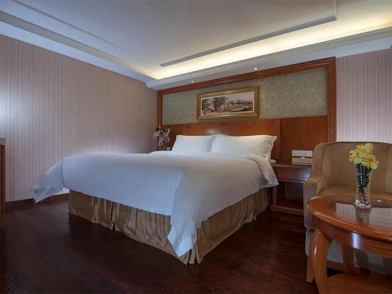 Bed in Vienna Hotel Mix City