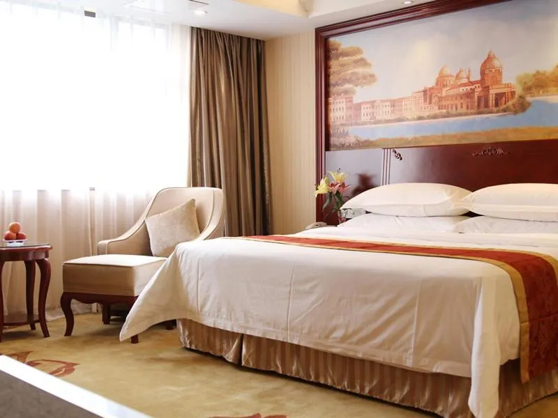 Bed in Vienna Hotel Foshan Nanhai City Square