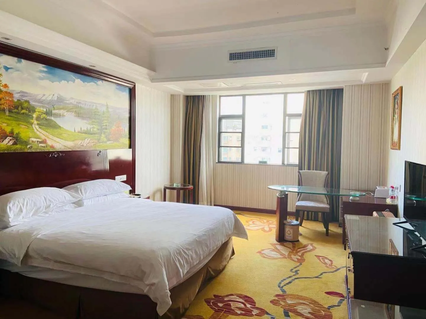 Bed in Vienna Hotel Foshan Nanhai City Square