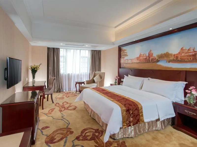 Bed in Vienna Hotel Foshan Nanhai City Square