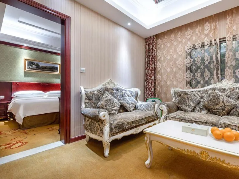 Bed in Vienna Hotel Shanghai Songjiang Wanda
